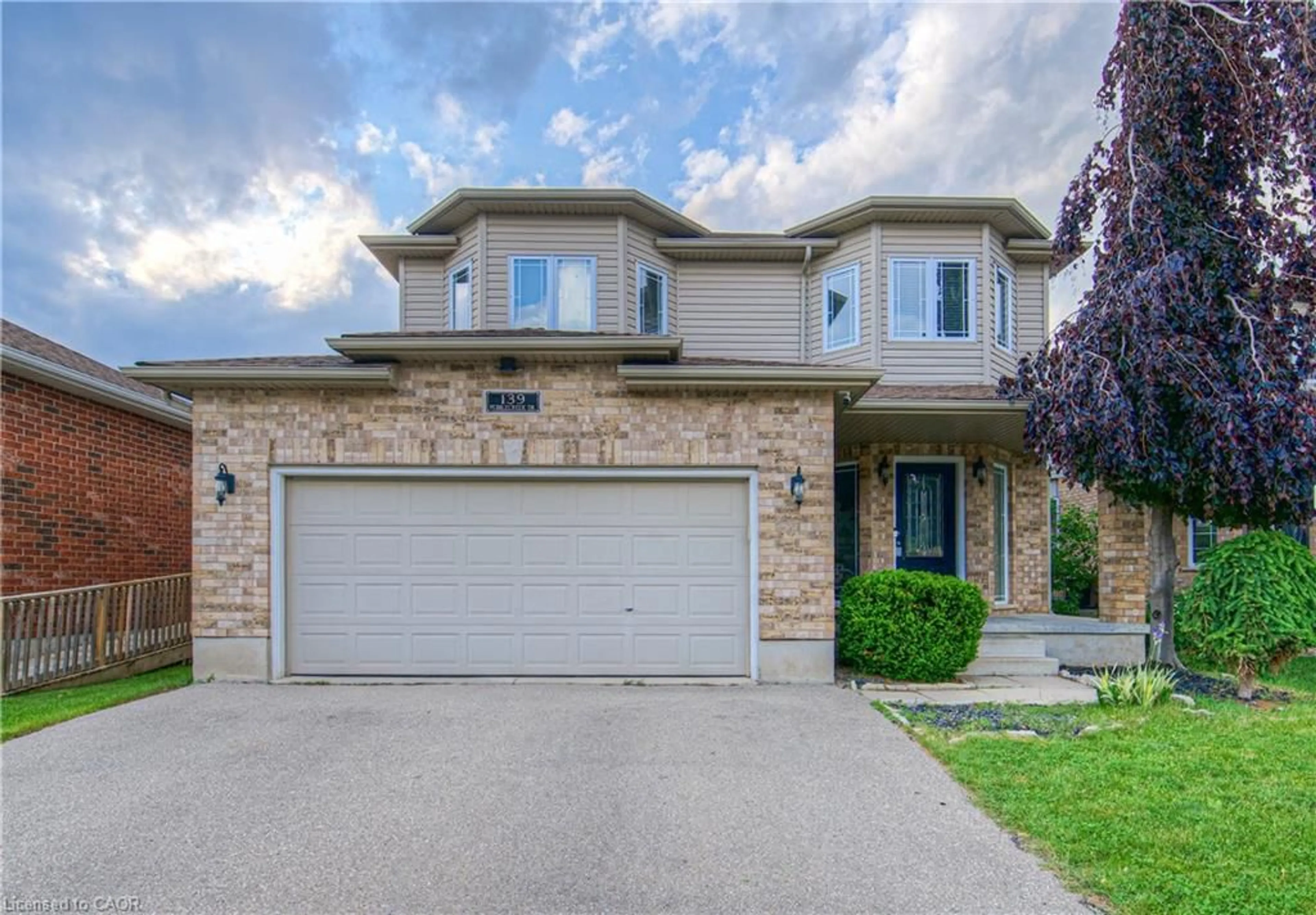 Home with brick exterior material, street for 139 Pebblecreek Dr, Kitchener Ontario N2A 4M4
