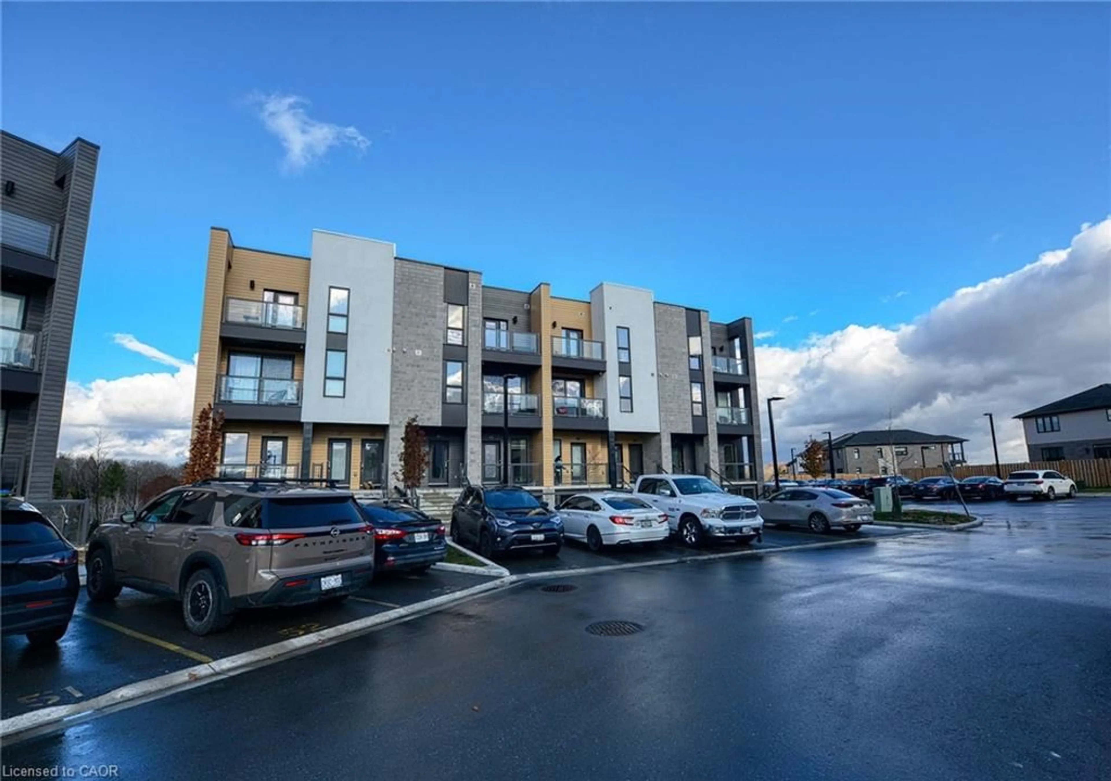 A pic from outside/outdoor area/front of a property/back of a property/a pic from drone, street for 261 Woodbine Ave #64, Kitchener Ontario N2R 0S7