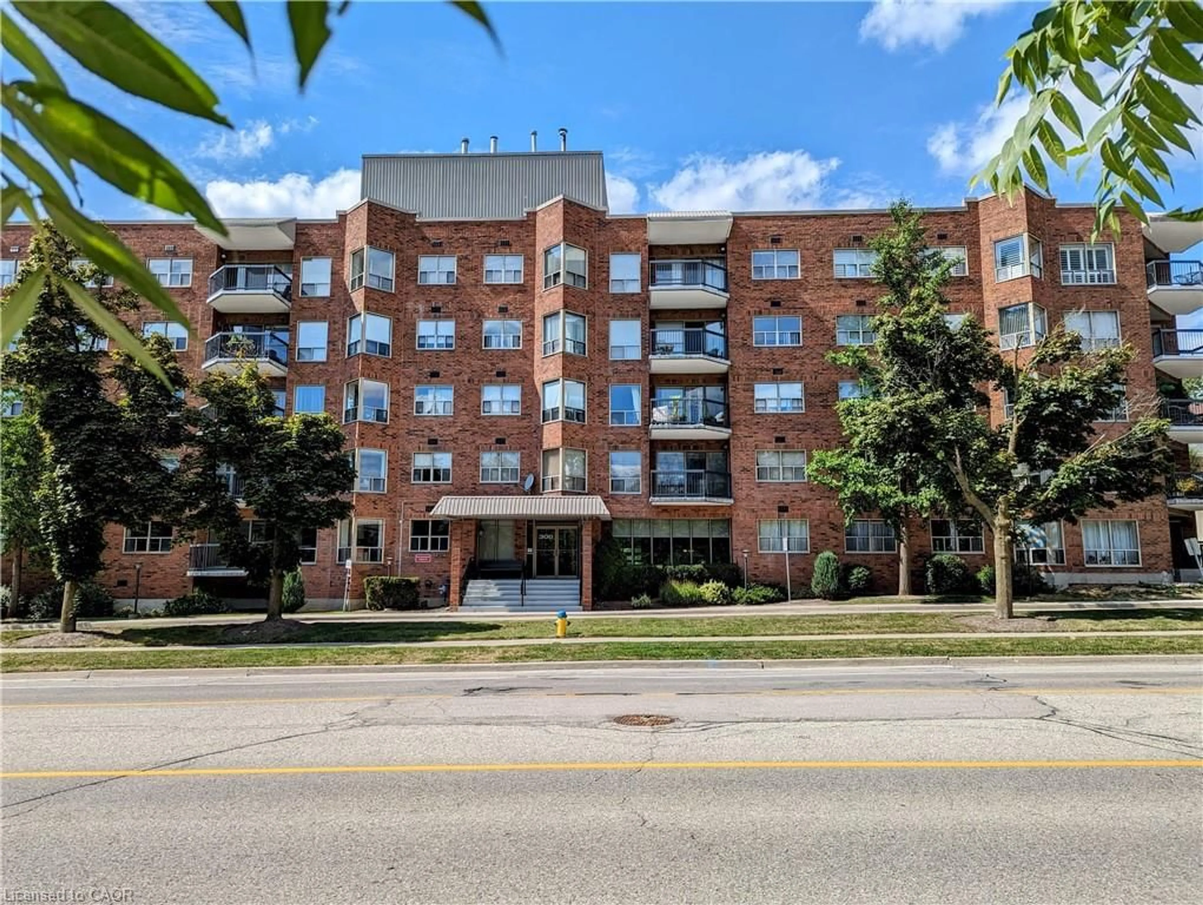 Home with brick exterior material, building for 300 Keats Way #407, Waterloo Ontario N2L 6E6