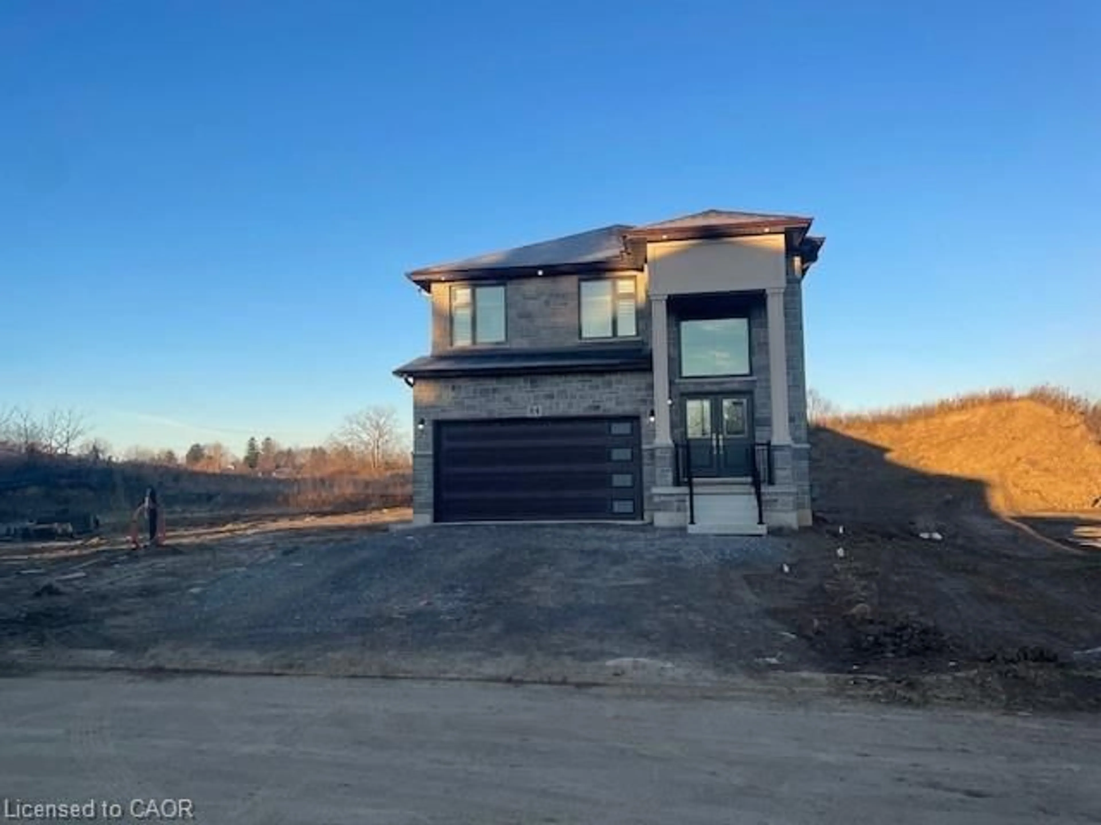 Home with brick exterior material, street for 64 Alexsia St, Hamilton Ontario L9B 0L1