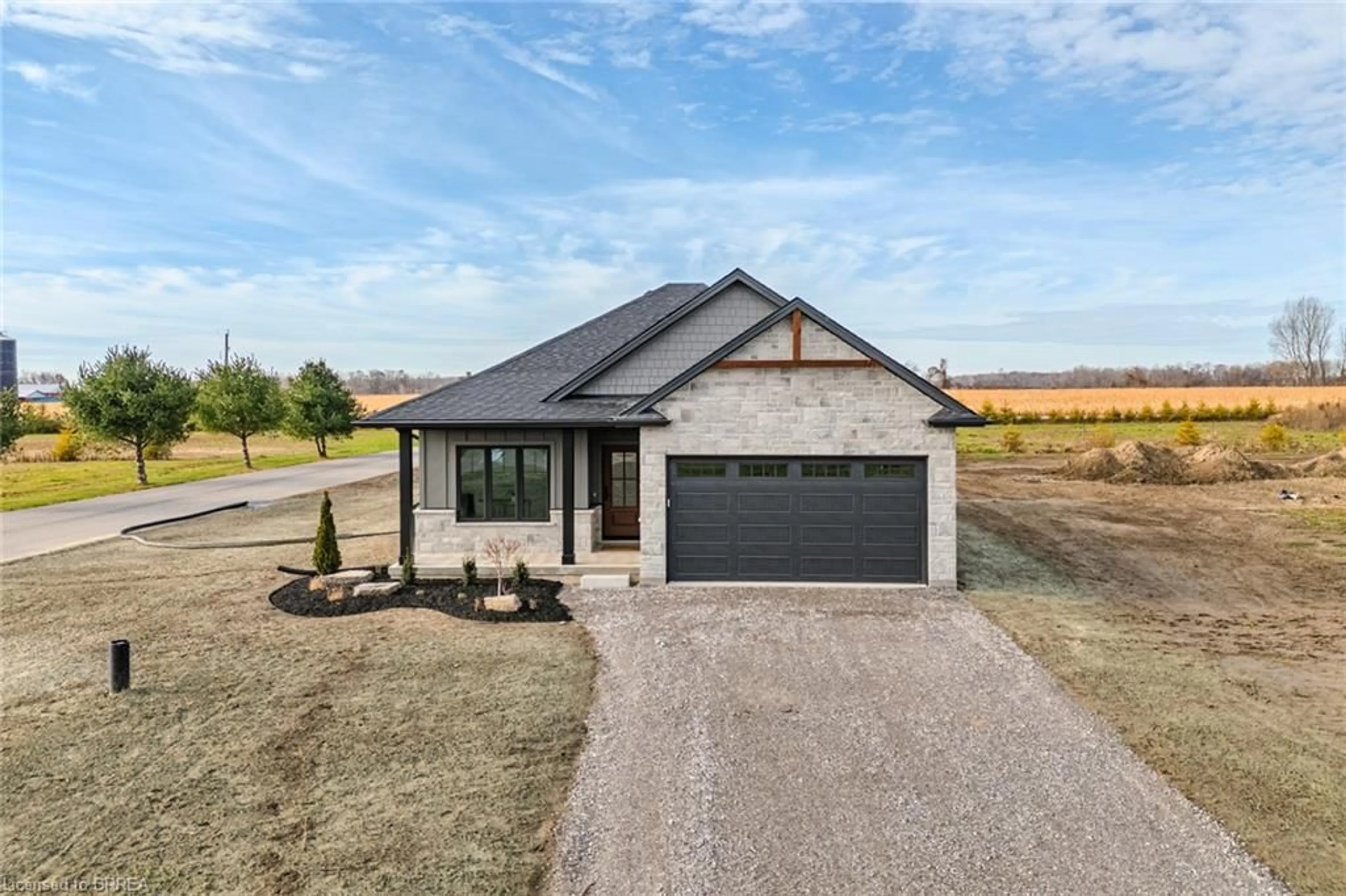 A pic from outside/outdoor area/front of a property/back of a property/a pic from drone, street for 51 Wild Rose Lane, St. Williams Ontario N0E 1P0