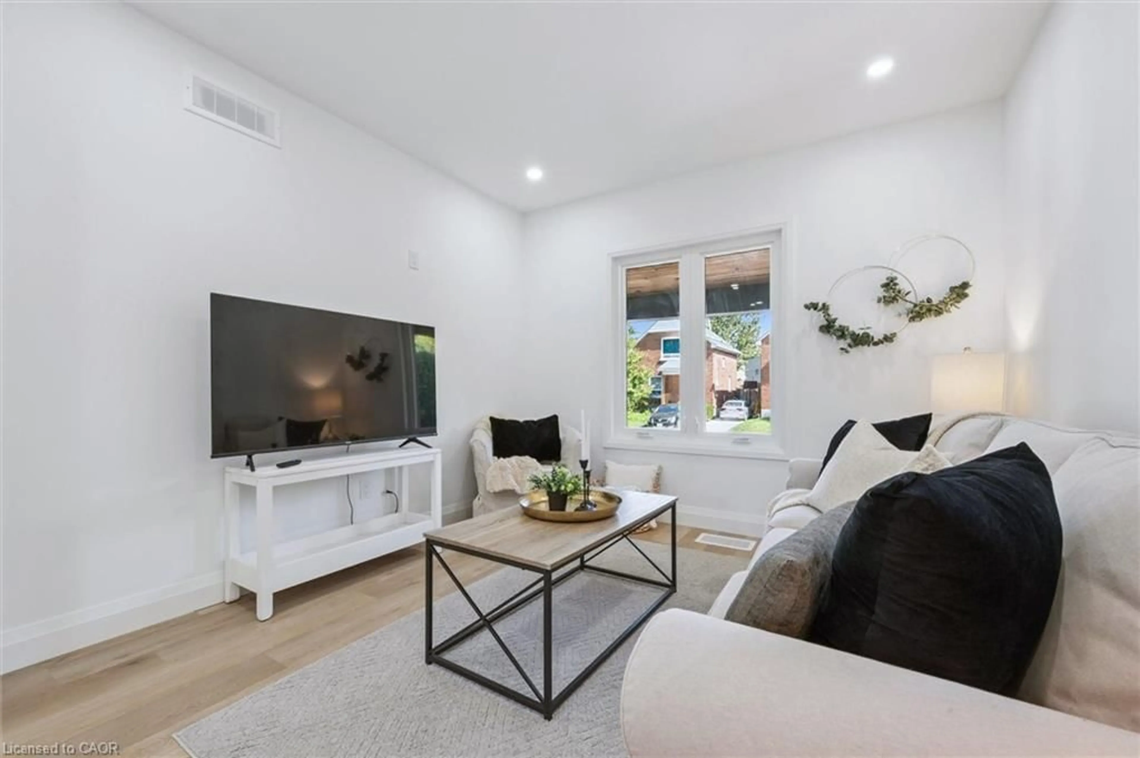 Living room with furniture, unknown for 66 Trinity St, Stratford Ontario N5A 4P4