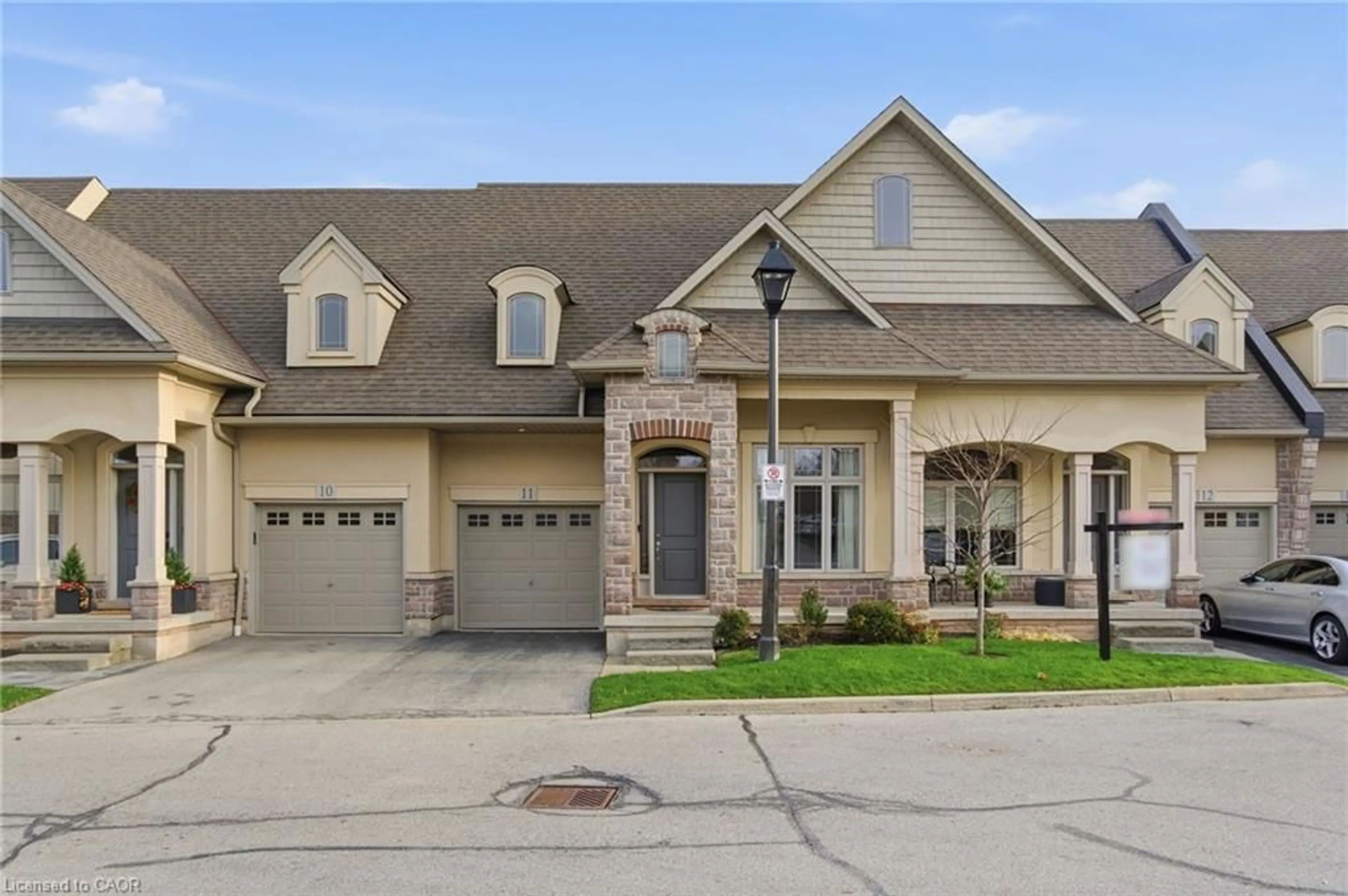 Home with brick exterior material, street for 5056 New St #11, Burlington Ontario L7L 0H4