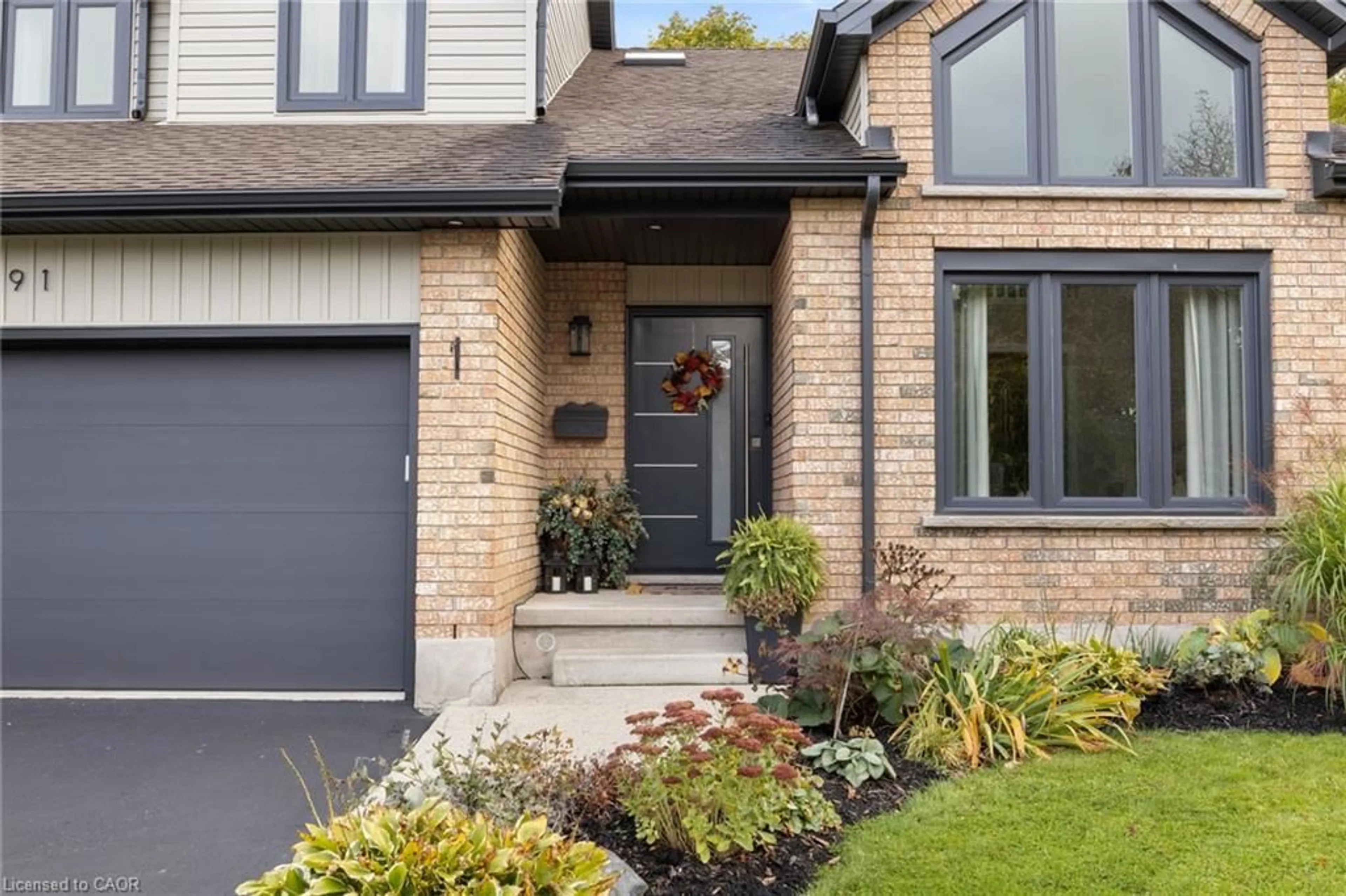Home with brick exterior material, street for 391 Strawberry Cres, Waterloo Ontario N2K 3J4