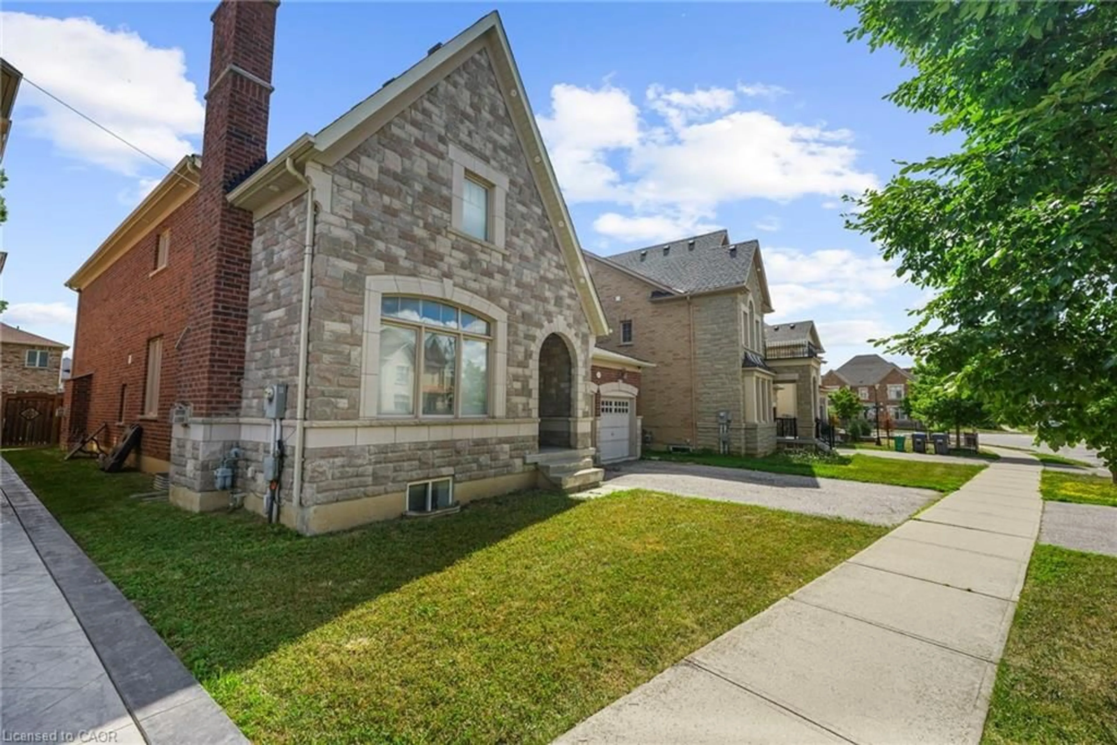 Home with brick exterior material, street for 5 Decorso Dr, Brampton Ontario L6P 3T7