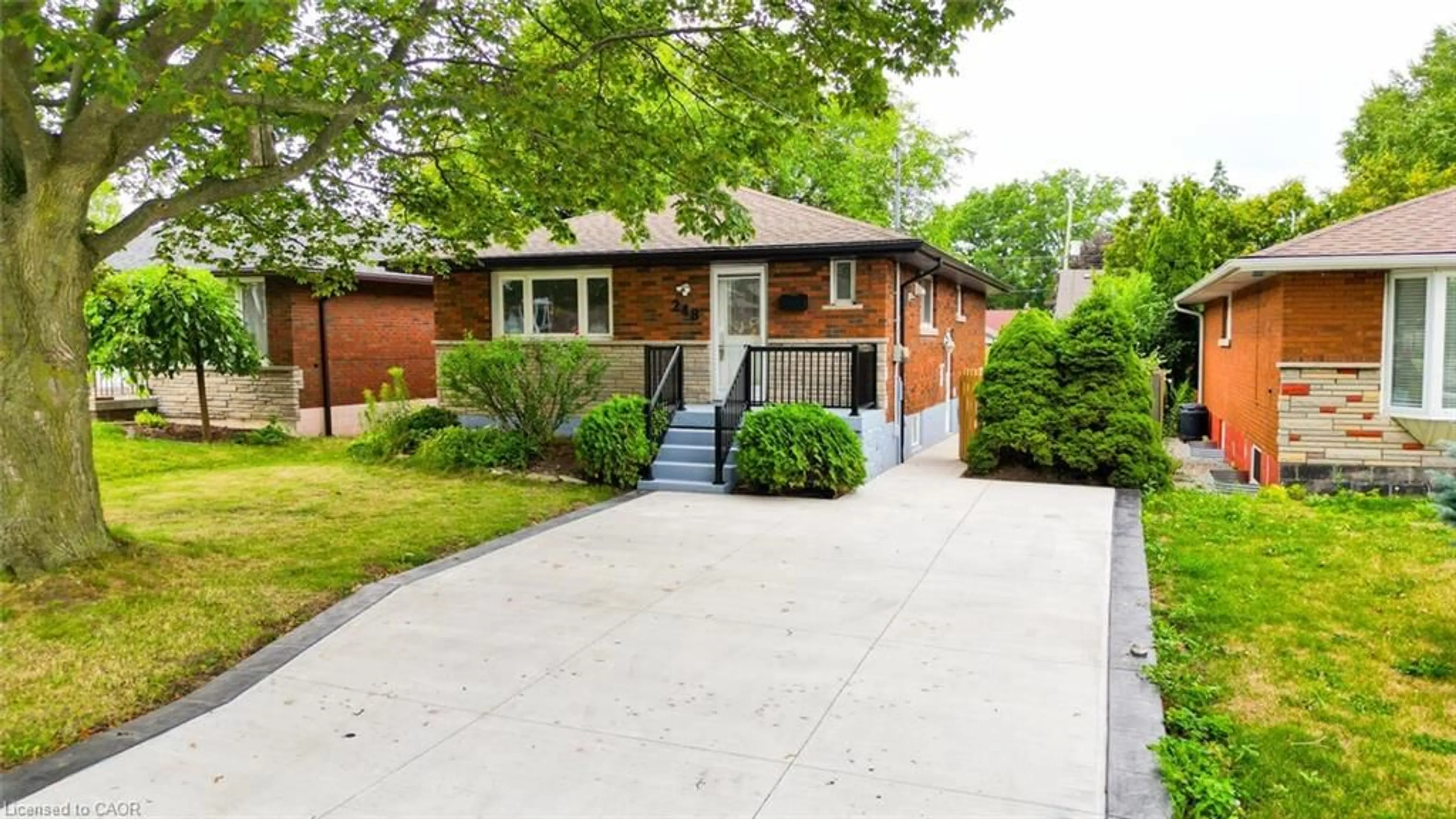 Home with brick exterior material, street for 248 West 18th St, Hamilton Ontario L9C 4G9