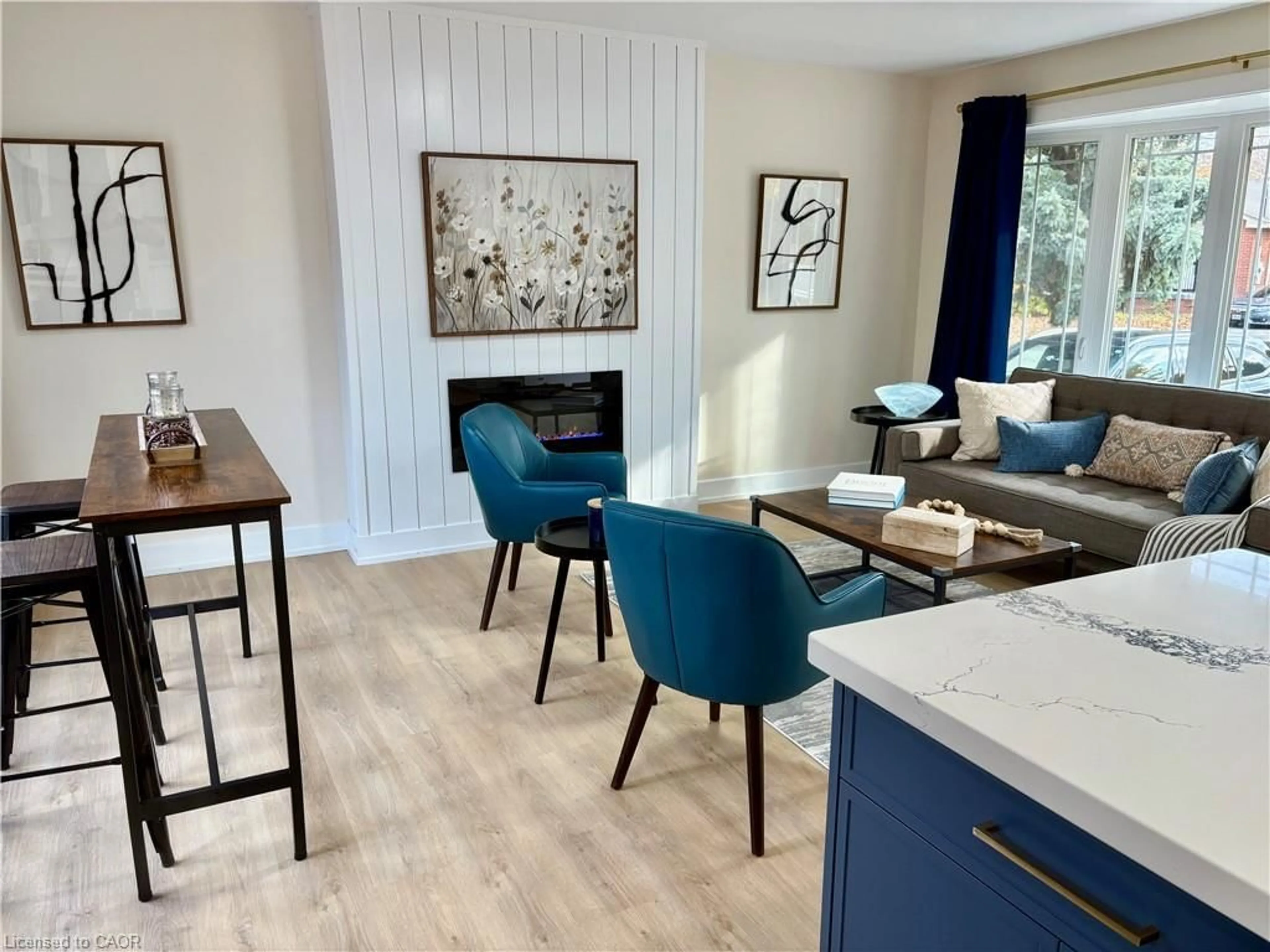 Open concept kitchen, wood/laminate floor for 72 West 25th St, Hamilton Ontario L9C 4X2