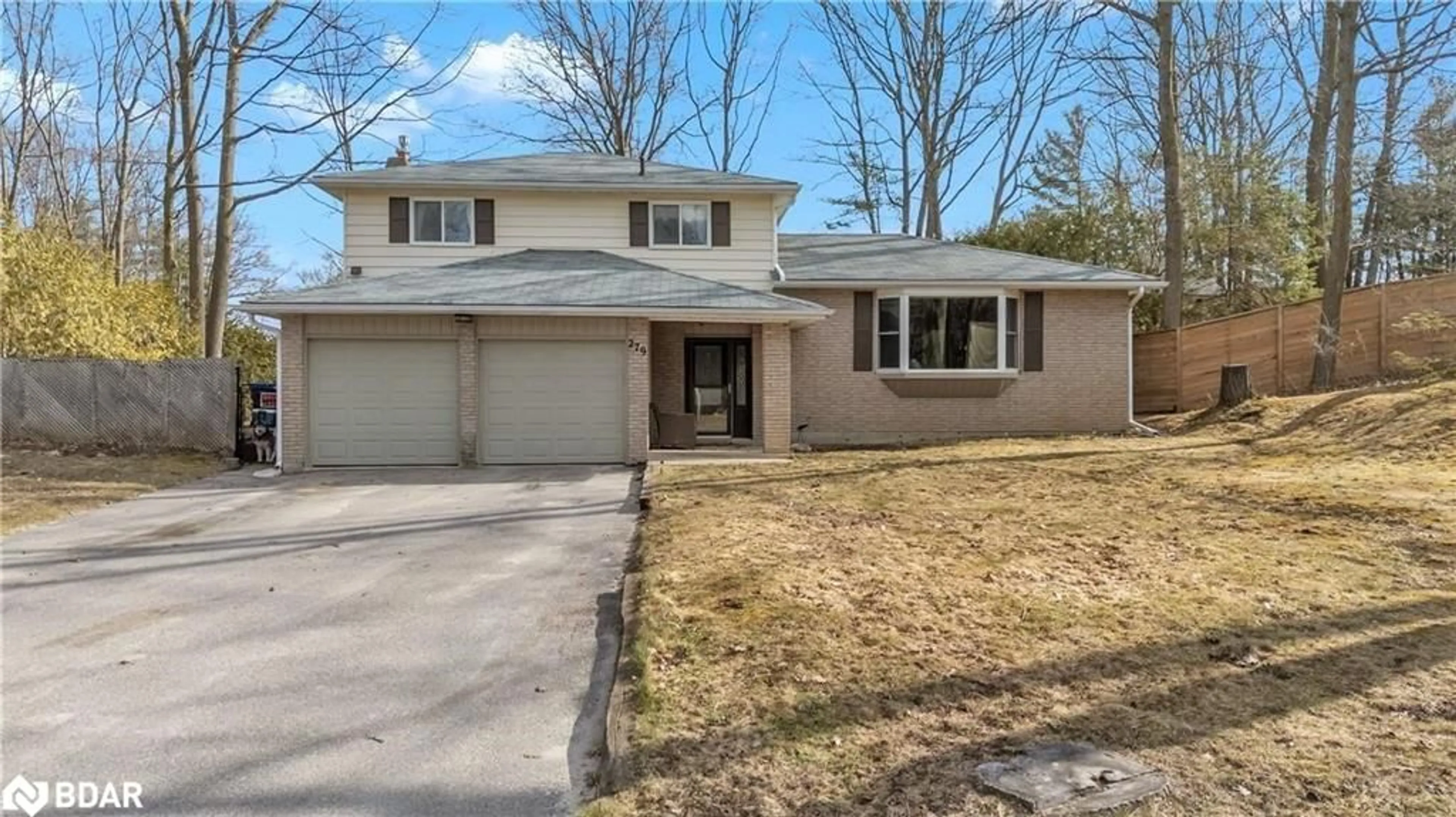 Home with brick exterior material, street for 279 Sunnidale Rd, Wasaga Beach Ontario L9Z 2T4