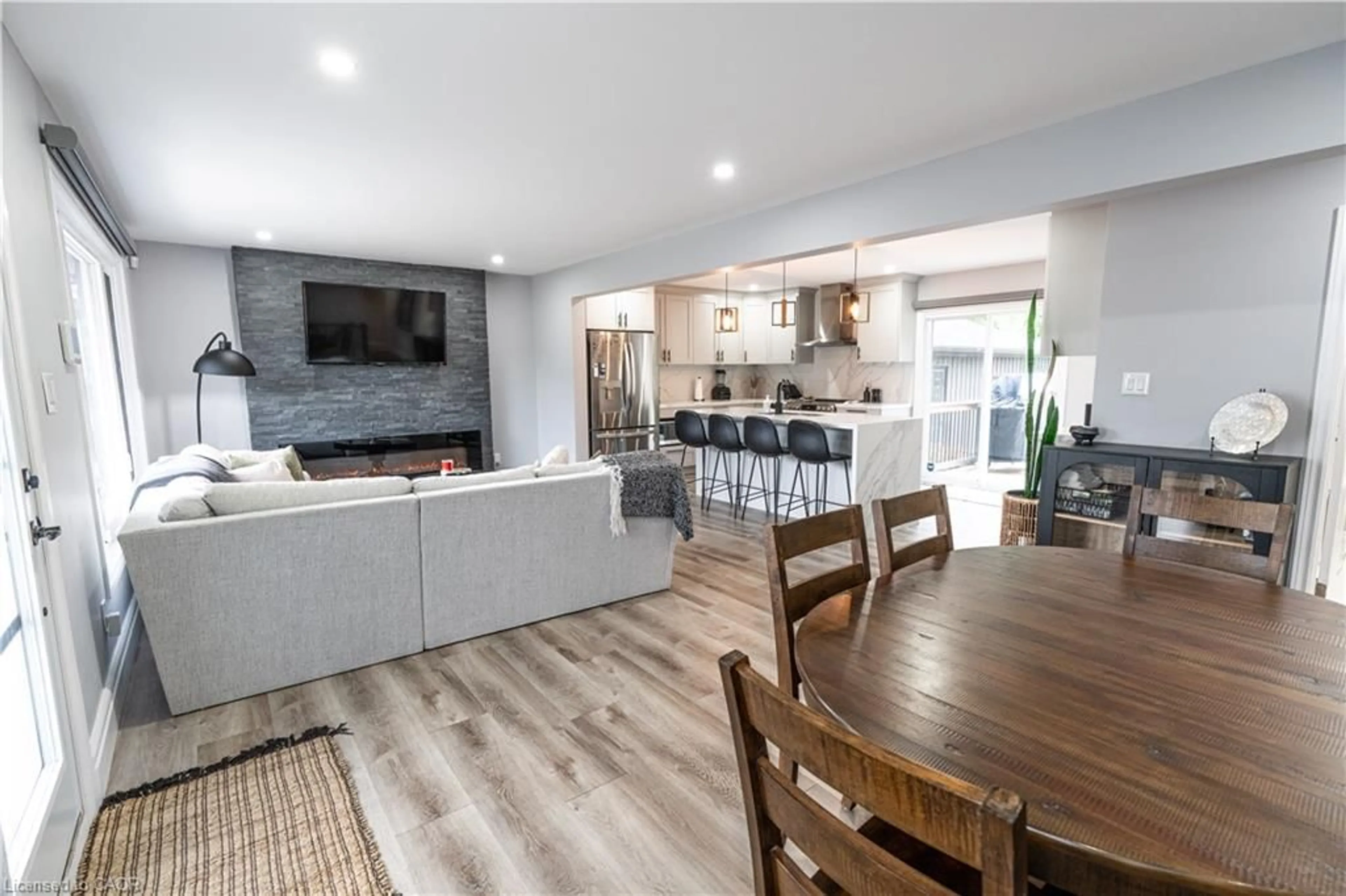 Open concept kitchen, wood/laminate floor for 19 Russell St, Brantford Ontario N3R 1Y8