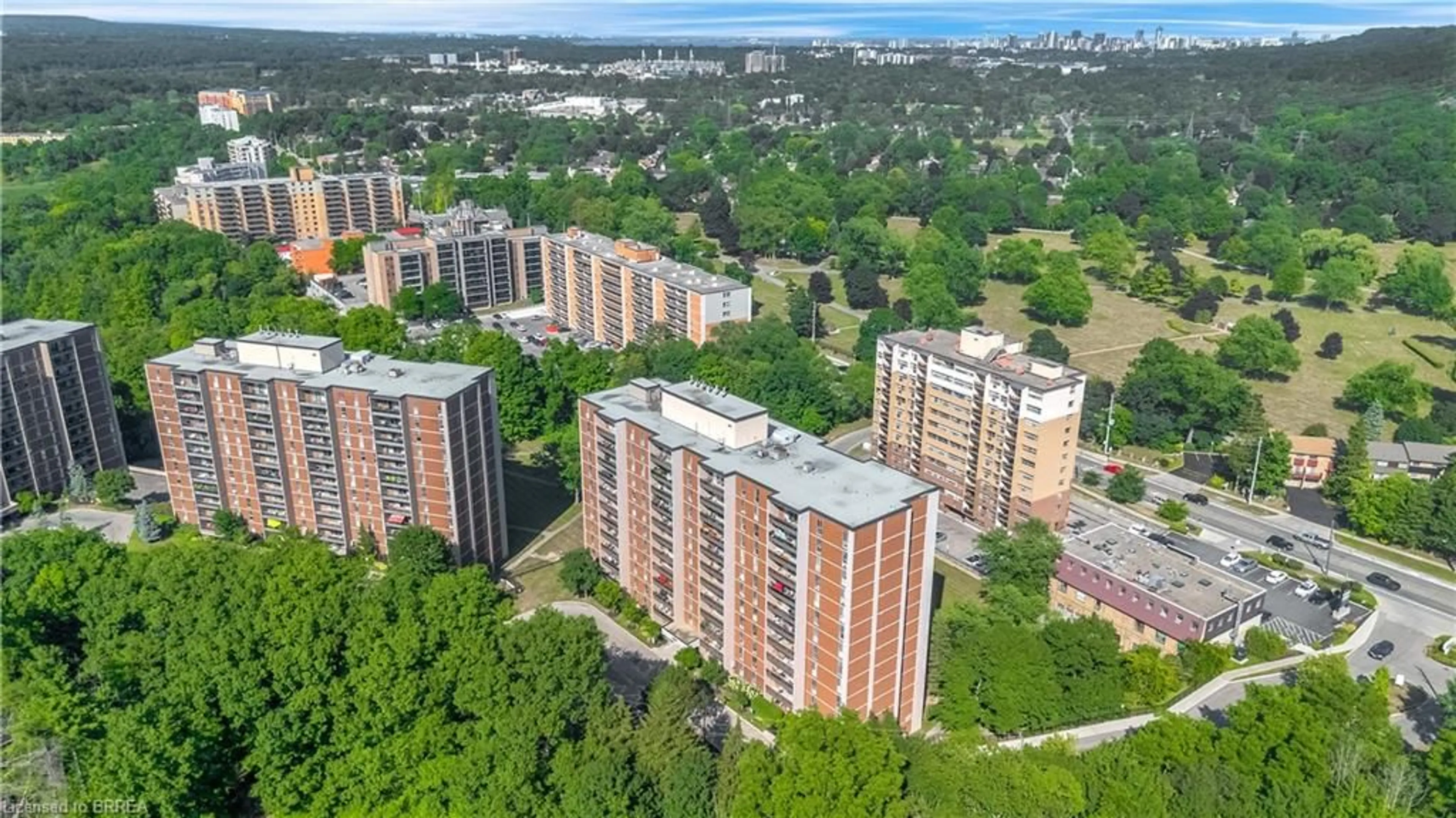 A pic from outside/outdoor area/front of a property/back of a property/a pic from drone, city buildings view from balcony for 1964 Main St #507, Hamilton Ontario L8S 1J5