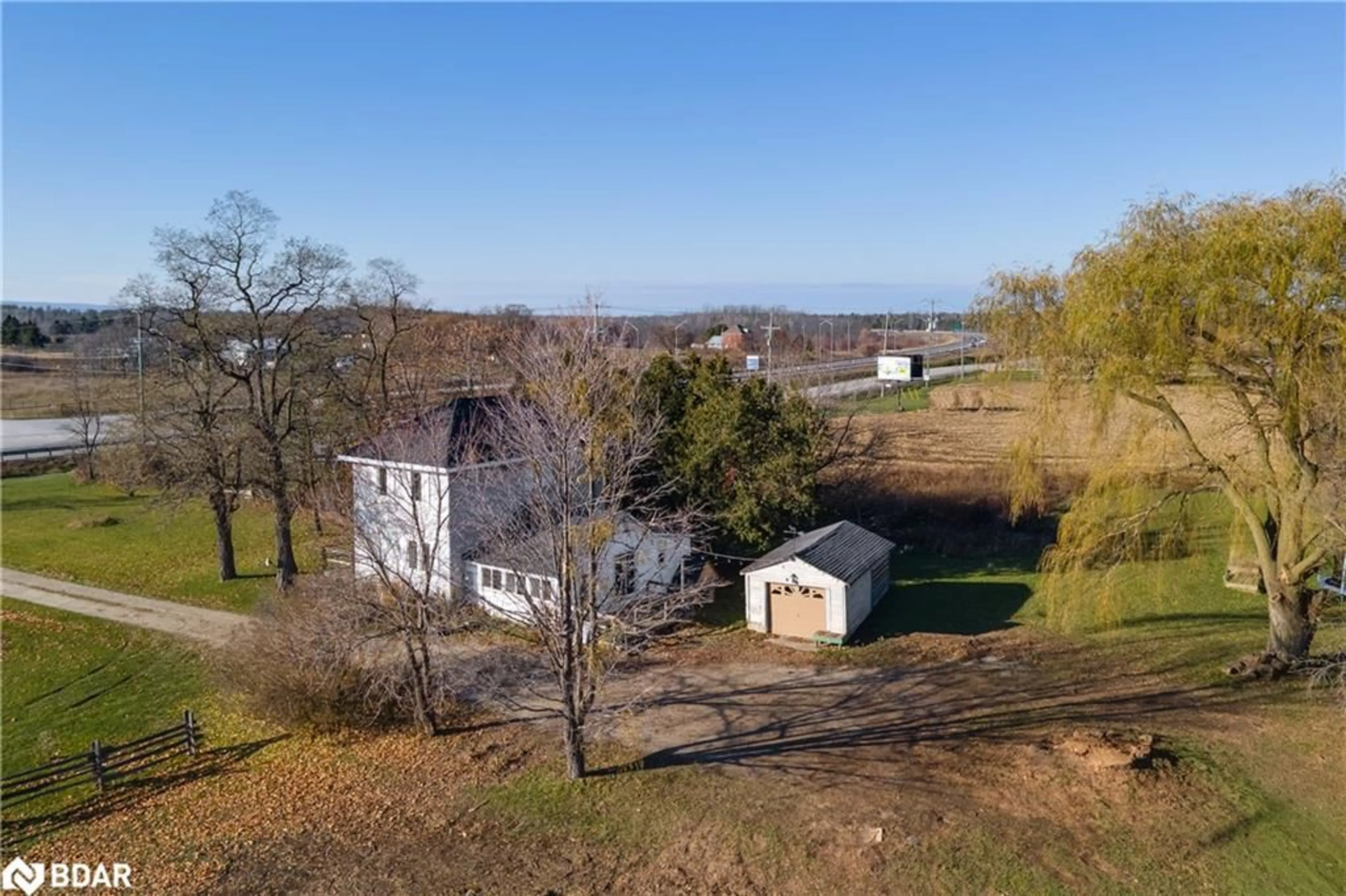 A pic from outside/outdoor area/front of a property/back of a property/a pic from drone, unknown for 8184 26 Hwy, Clearview Ontario L0M 1S0
