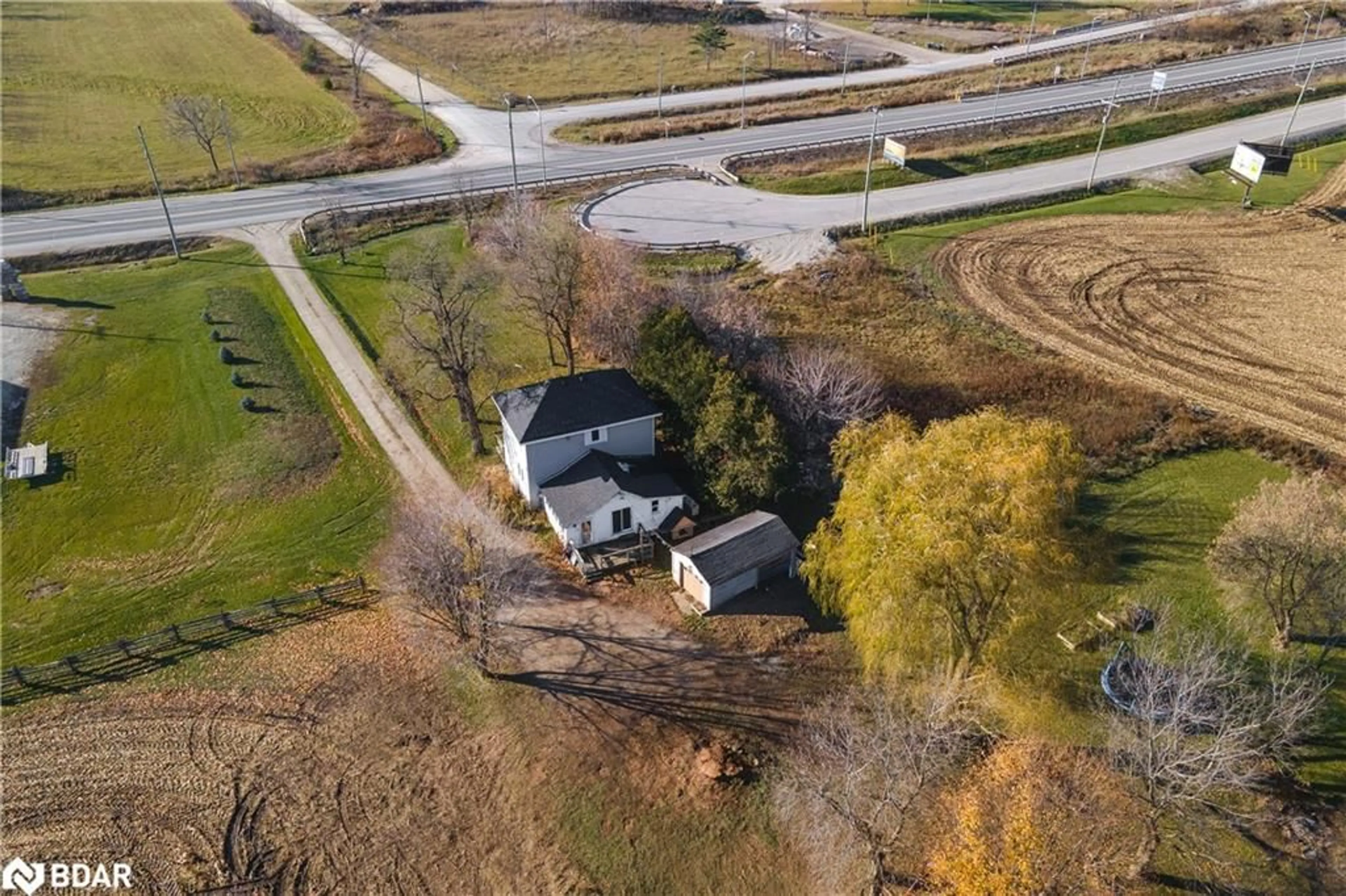 A pic from outside/outdoor area/front of a property/back of a property/a pic from drone, street for 8184 26 Hwy, Clearview Ontario L0M 1S0