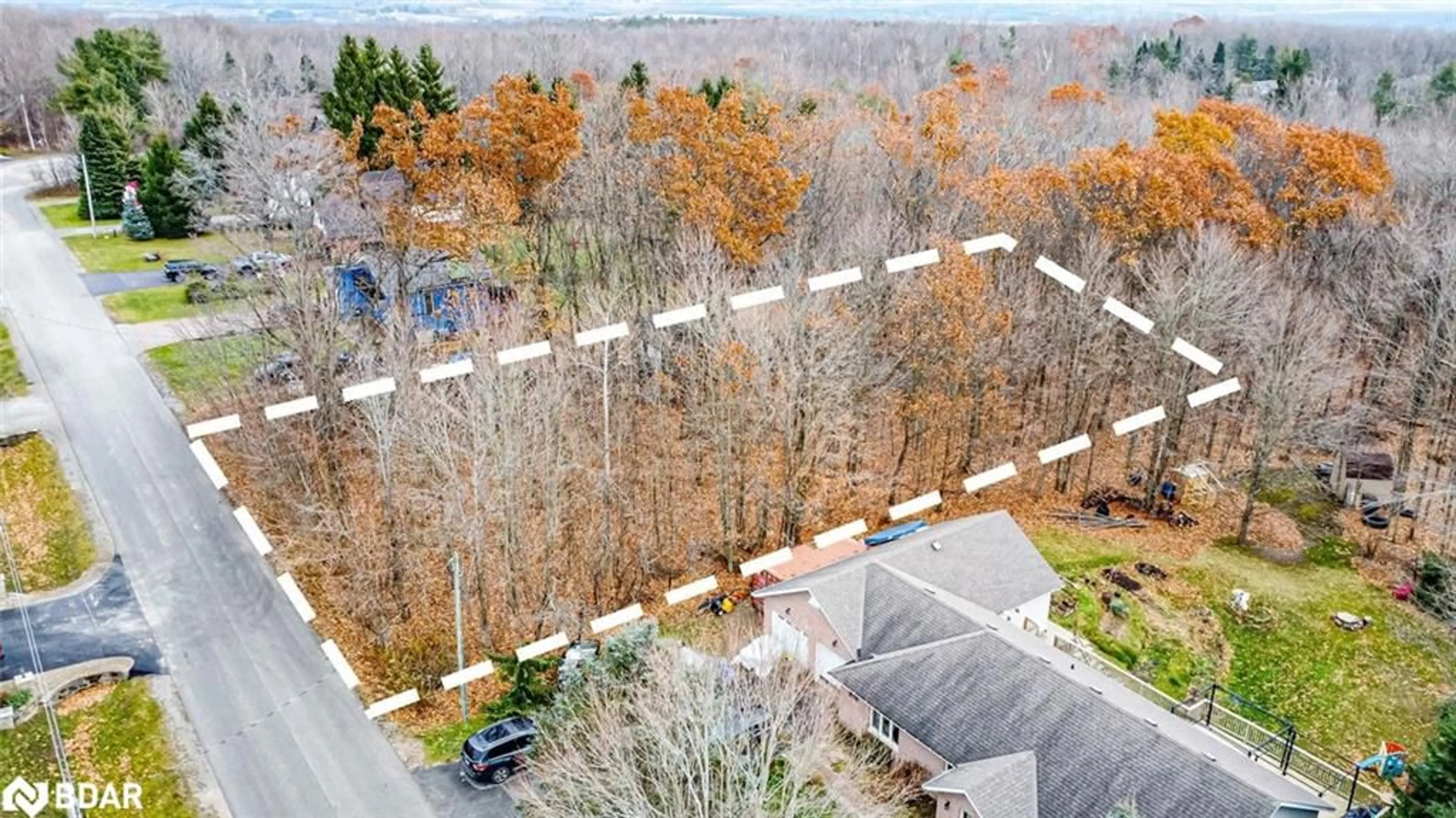A pic from outside/outdoor area/front of a property/back of a property/a pic from drone, forest/trees view for 17 Valleyview Dr, Moonstone Ontario L0K 1N0