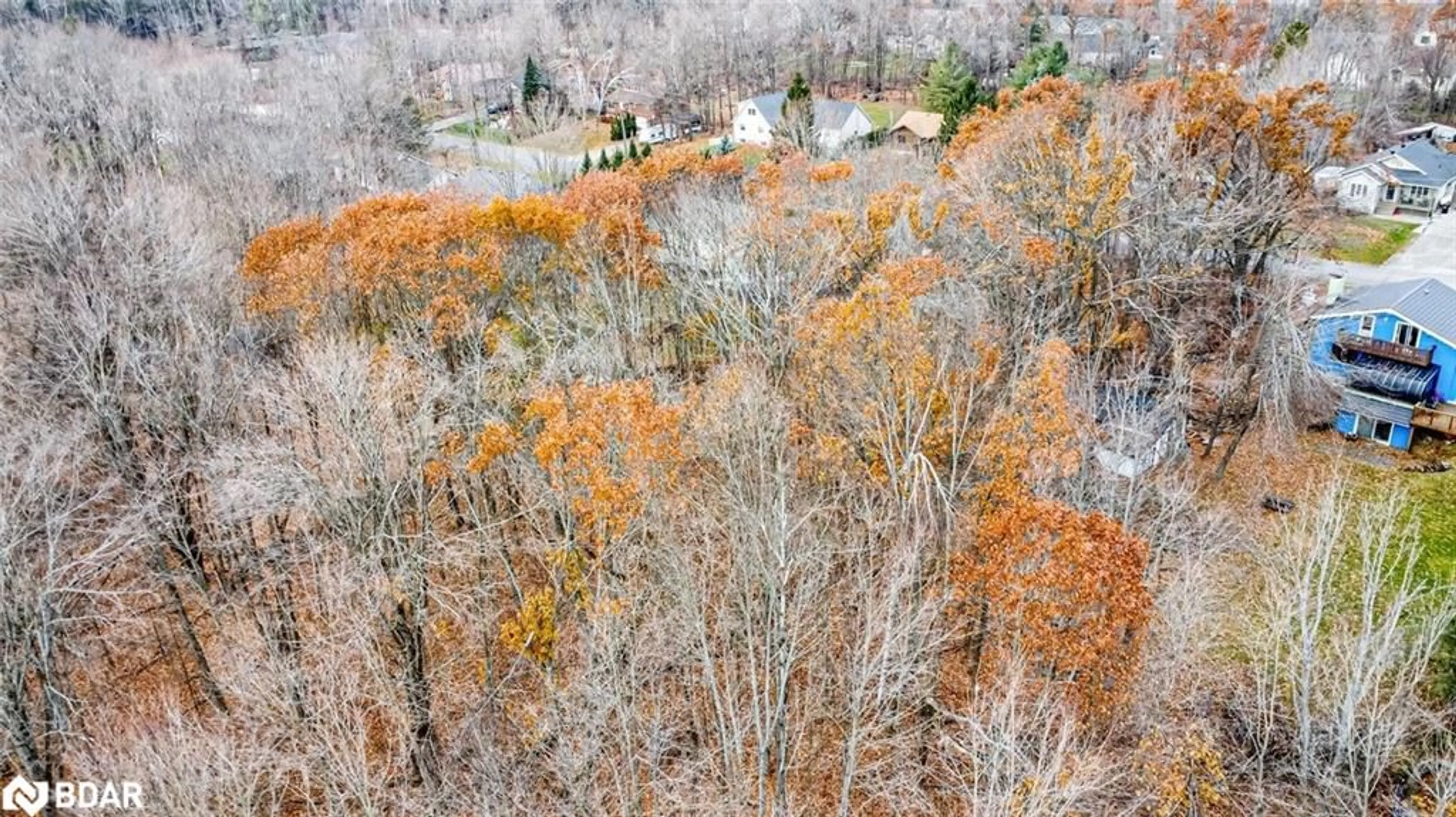 A pic from outside/outdoor area/front of a property/back of a property/a pic from drone, forest/trees view for 17 Valleyview Dr, Moonstone Ontario L0K 1N0