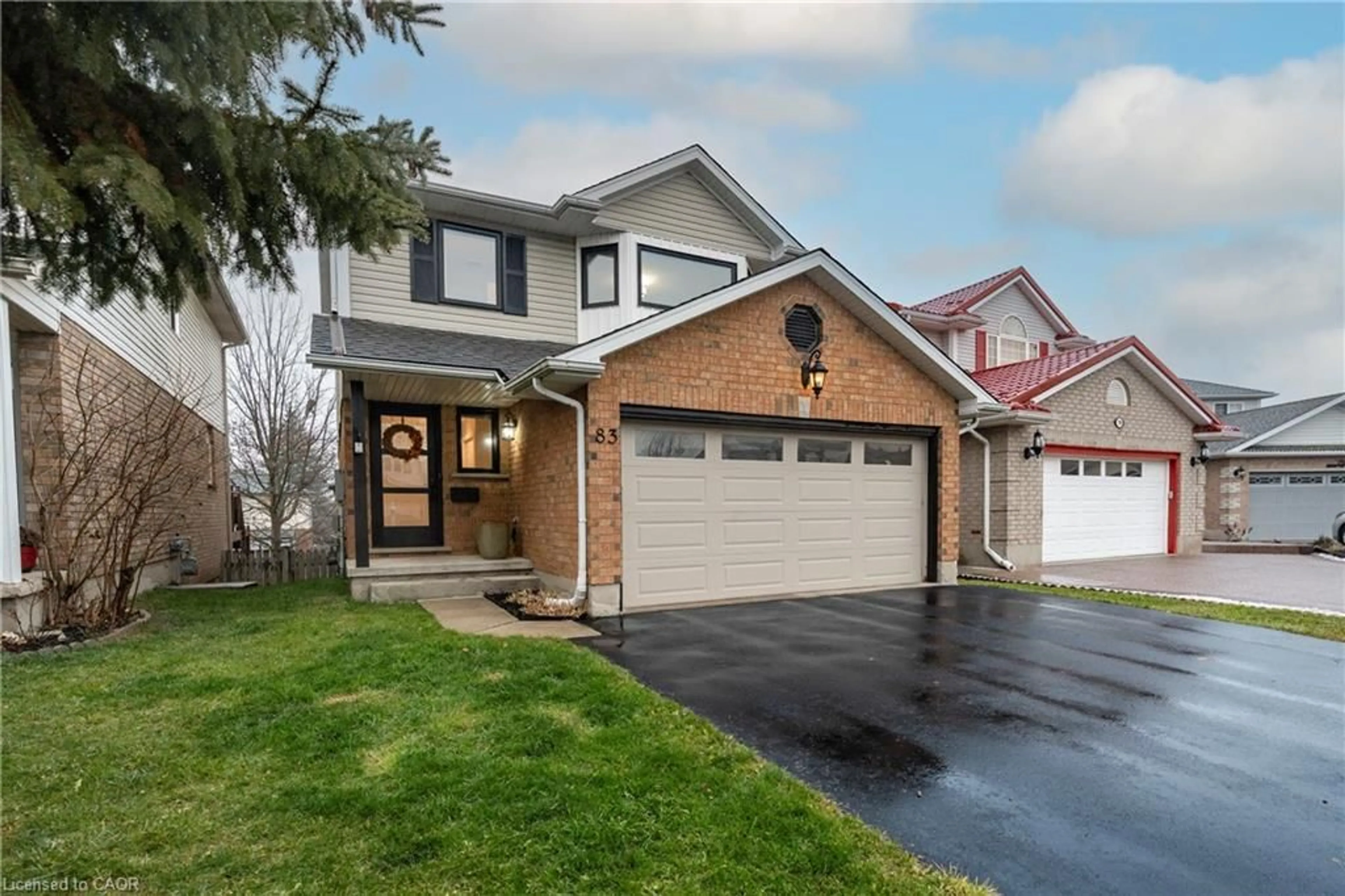 Home with vinyl exterior material, street for 83 Burnaby Cres, Kitchener Ontario N2N 3A1
