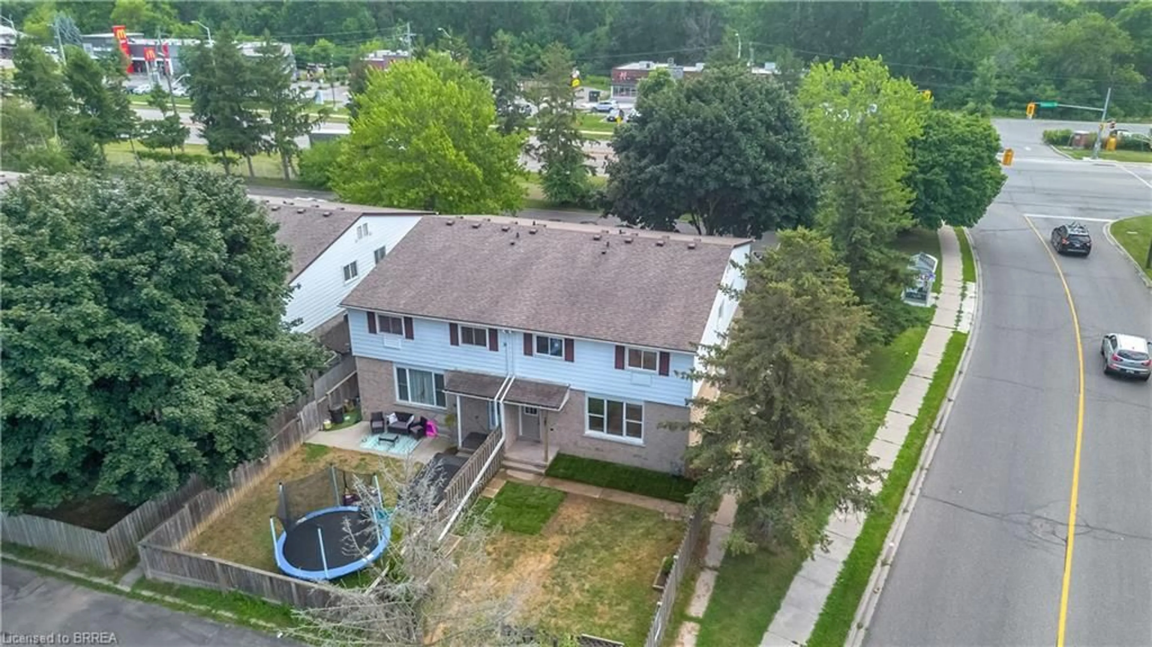 A pic from outside/outdoor area/front of a property/back of a property/a pic from drone, street for 34 Oakhill Dr #20B, Brantford Ontario N3T 1R1