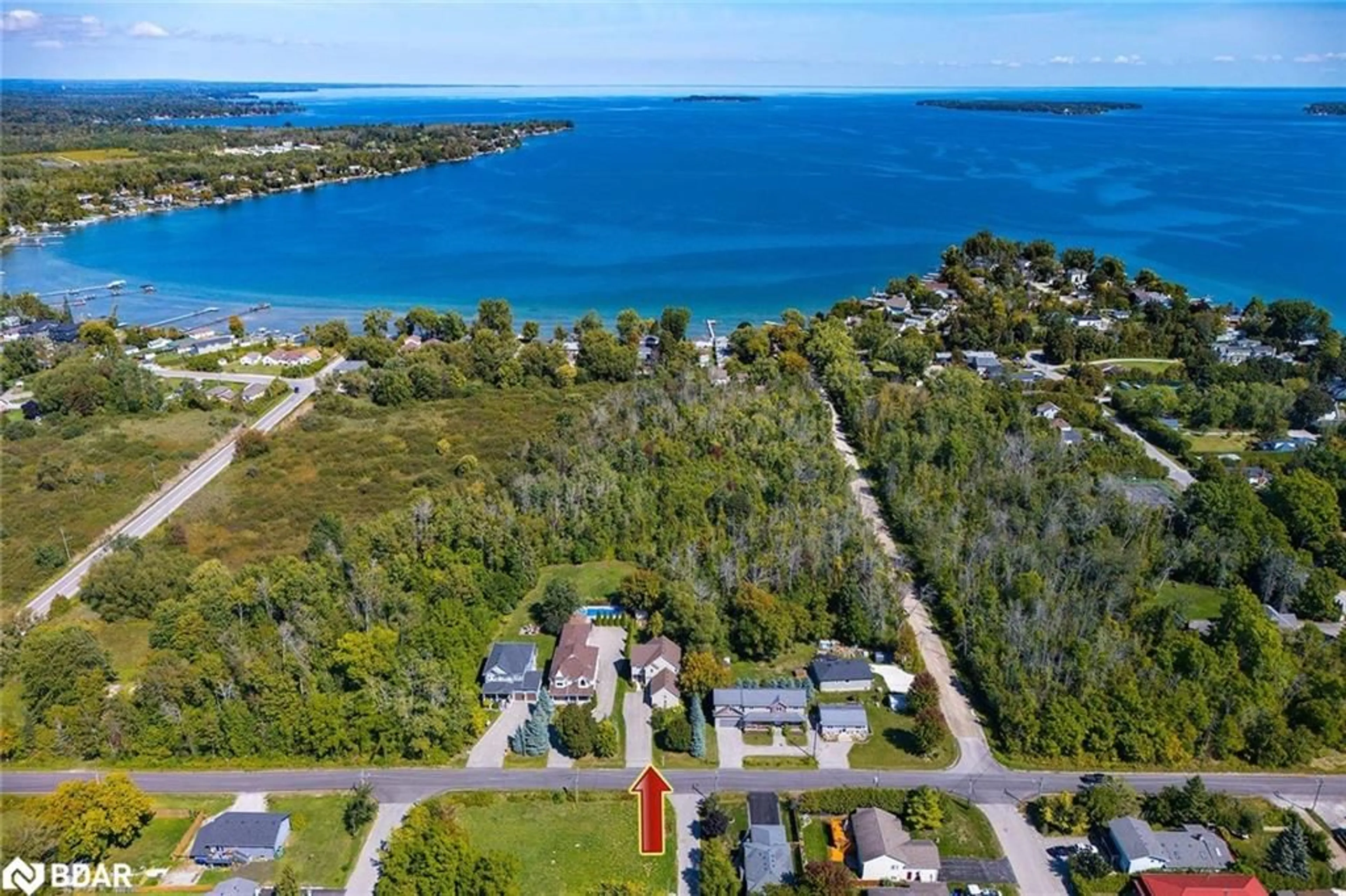 A pic from outside/outdoor area/front of a property/back of a property/a pic from drone, water/lake/river/ocean view for 995 Chapman St, Bell Ewart Ontario L0L 1W0