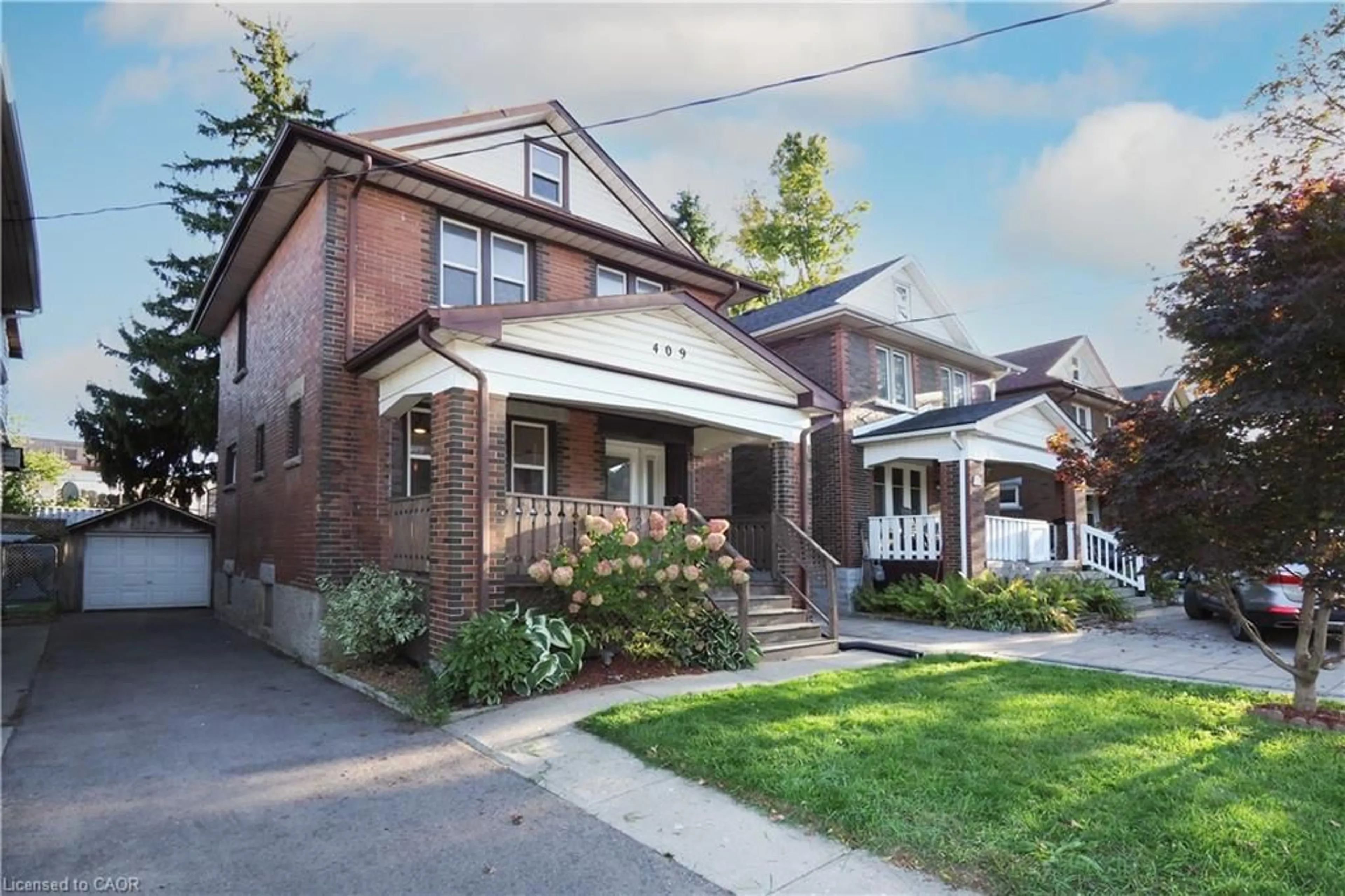 Home with brick exterior material, street for 409 Wellington St, Kitchener Ontario N2H 5L3