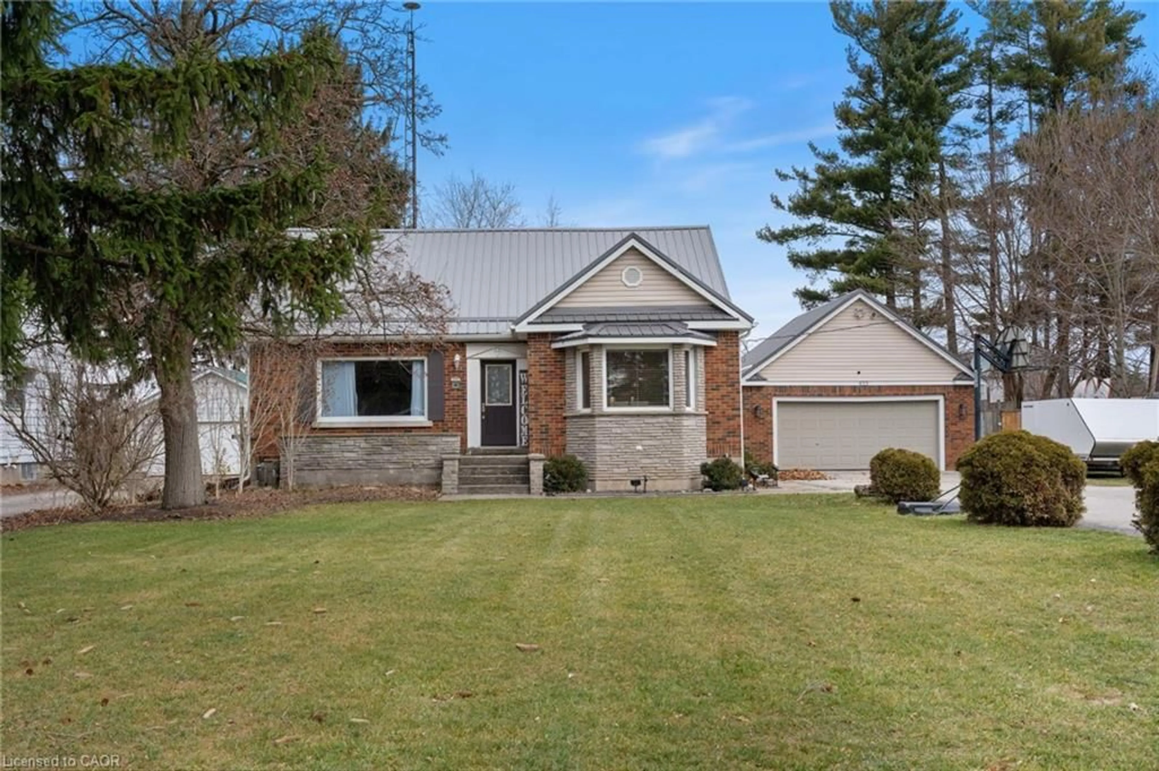 Home with brick exterior material, street for 435 Talbot Rd, Delhi Ontario N4B 2A4