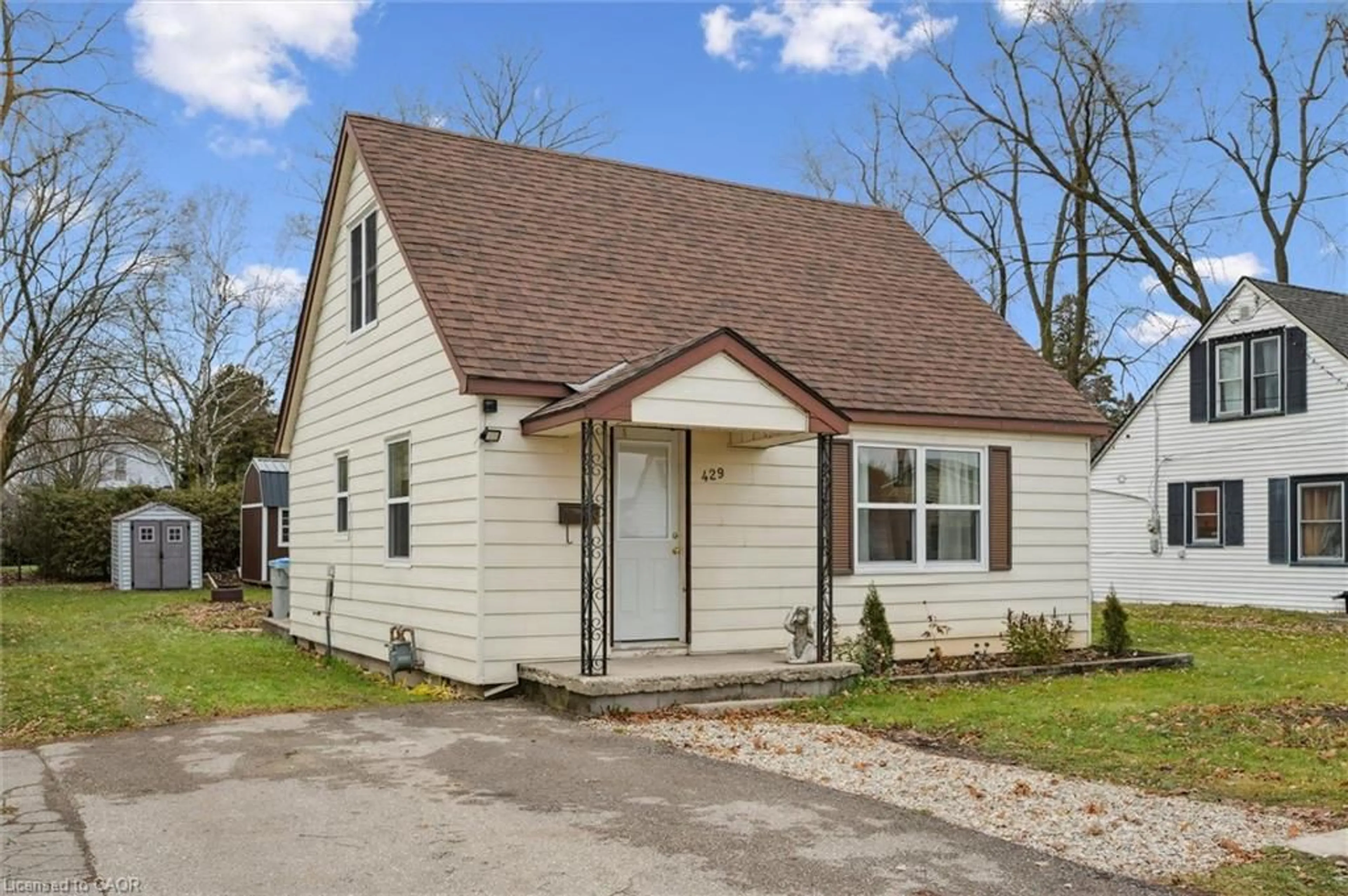 Home with vinyl exterior material, street for 429 Clayton St, Listowel Ontario N4W 2G4