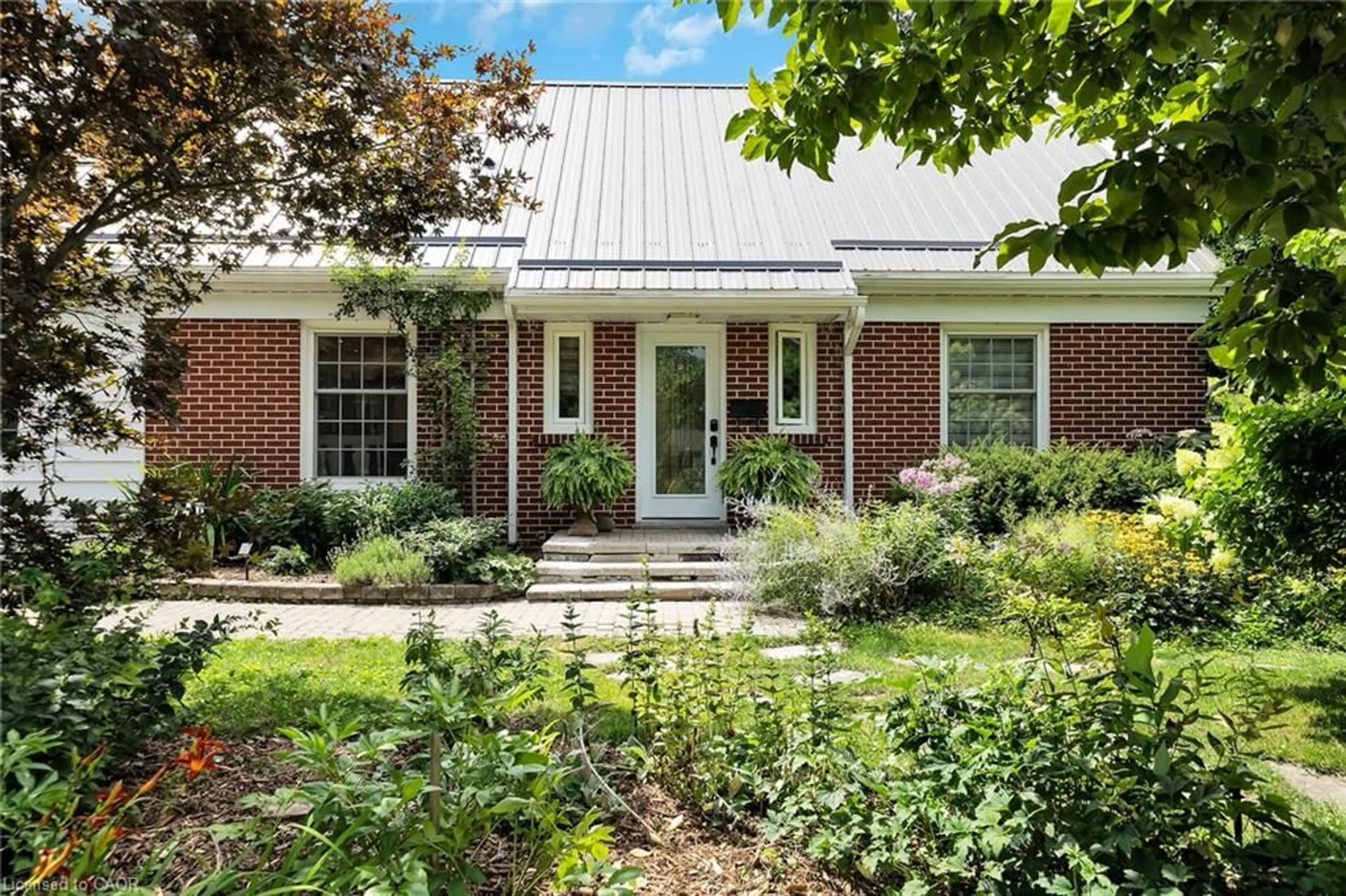 Home with brick exterior material, street for 14 Simcoe Blvd, Simcoe Ontario N3Y 3L5