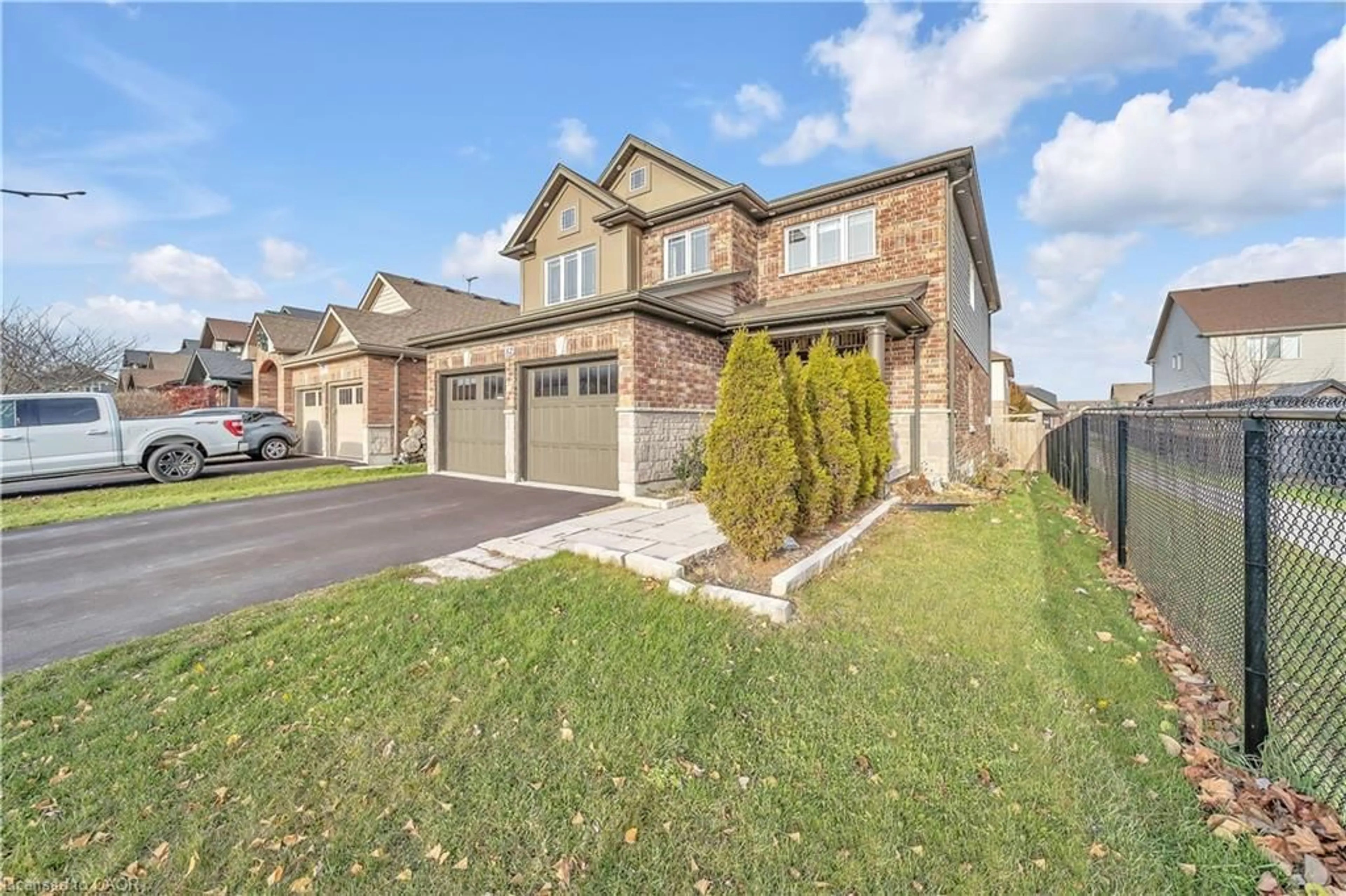 Home with brick exterior material, street for 52 Riley Cres, Centre Wellington Ontario N1M 0C2