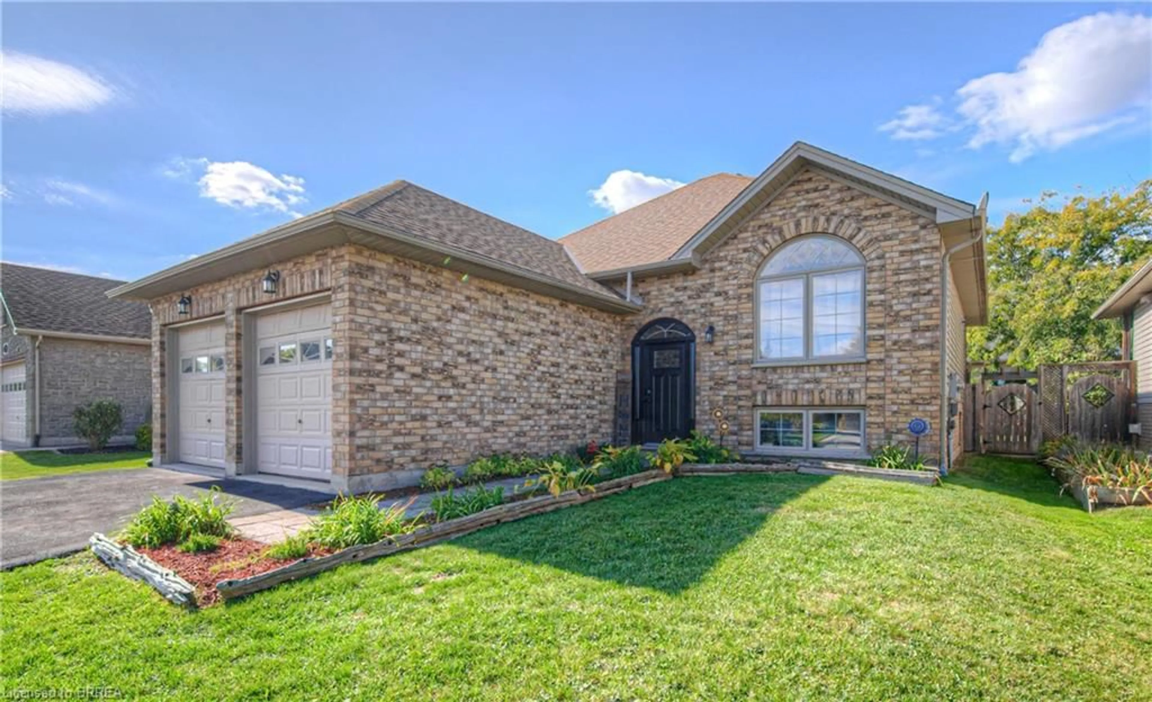 Home with brick exterior material, street for 14 Laycock St, Brantford Ontario N3S 0A3