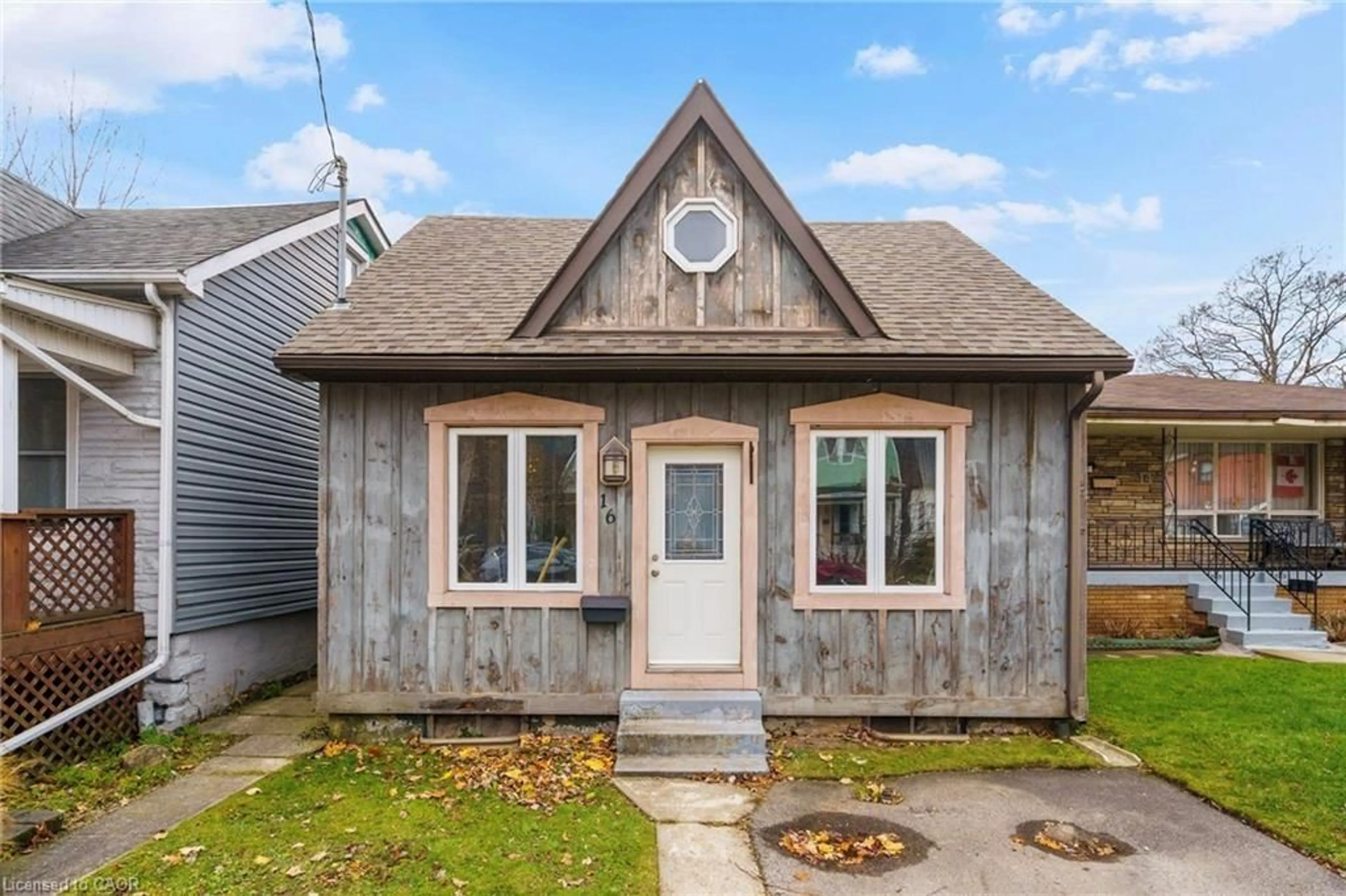 Home with vinyl exterior material, street for 16 Edison St, Hamilton Ontario L8P 1G6