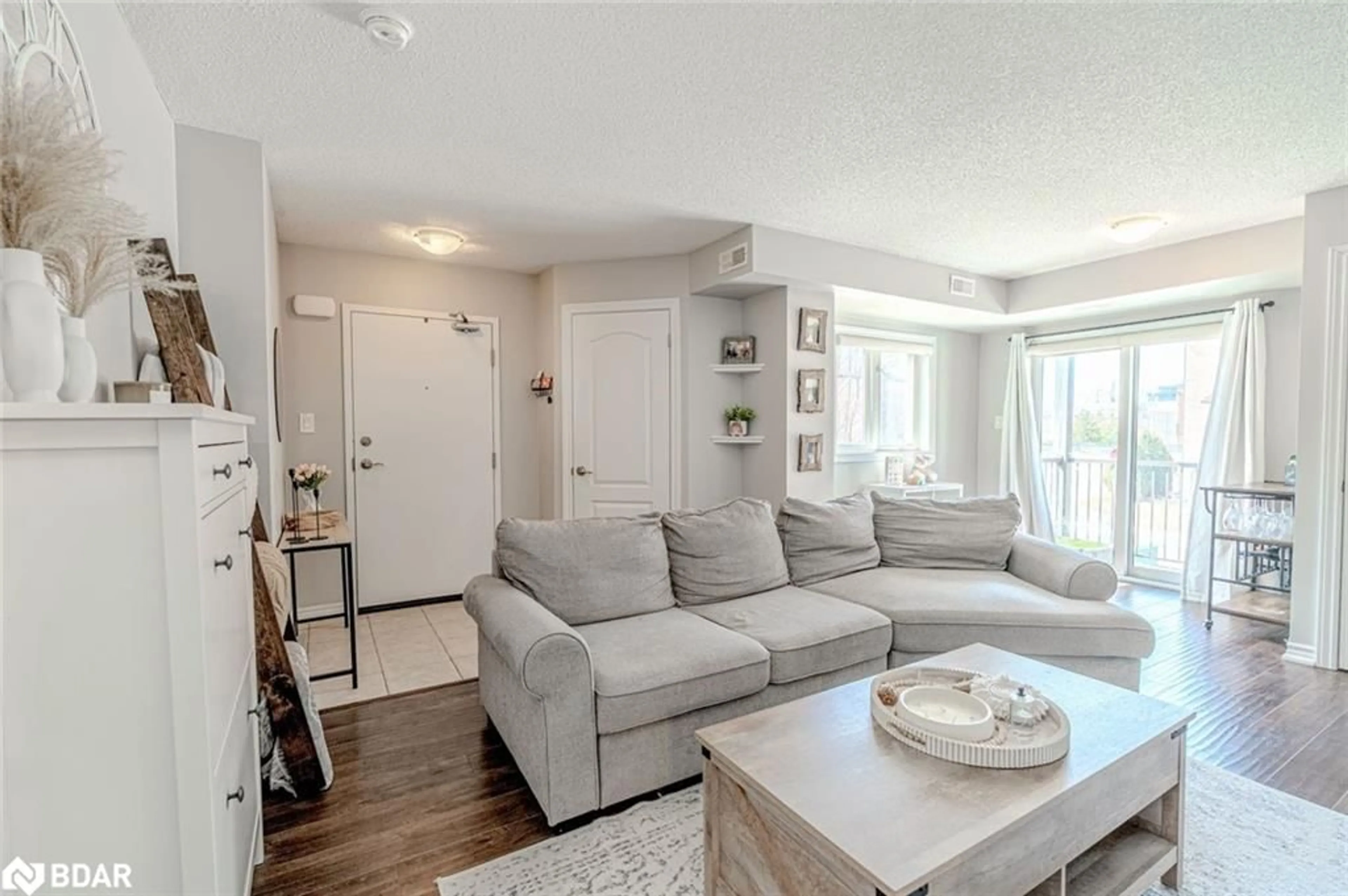 Living room with furniture, unknown for 25 Madelaine Dr #7, Barrie Ontario L9J 0G8