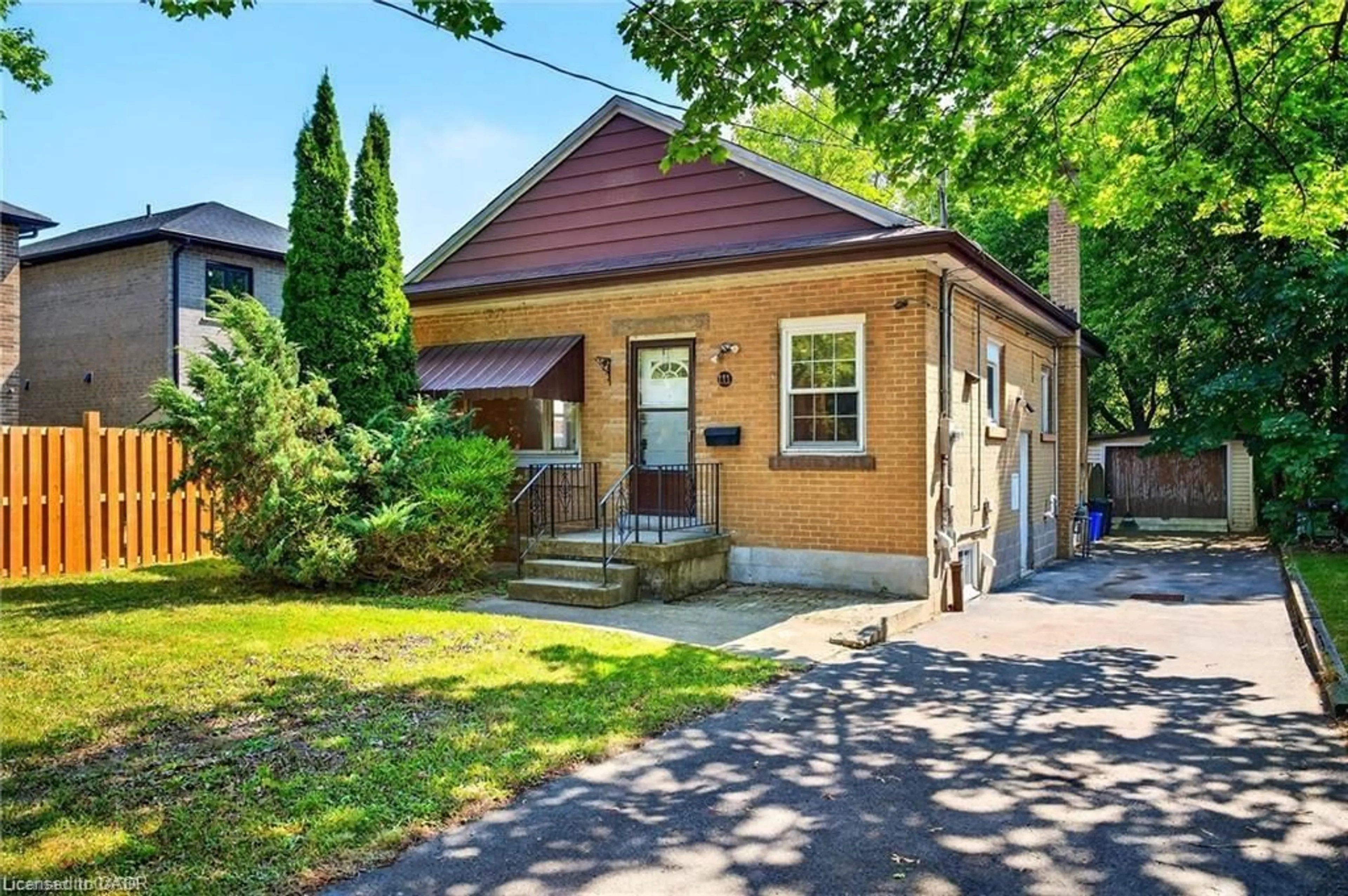 Home with brick exterior material, street for 111 Leland St, Hamilton Ontario L8S 3A3