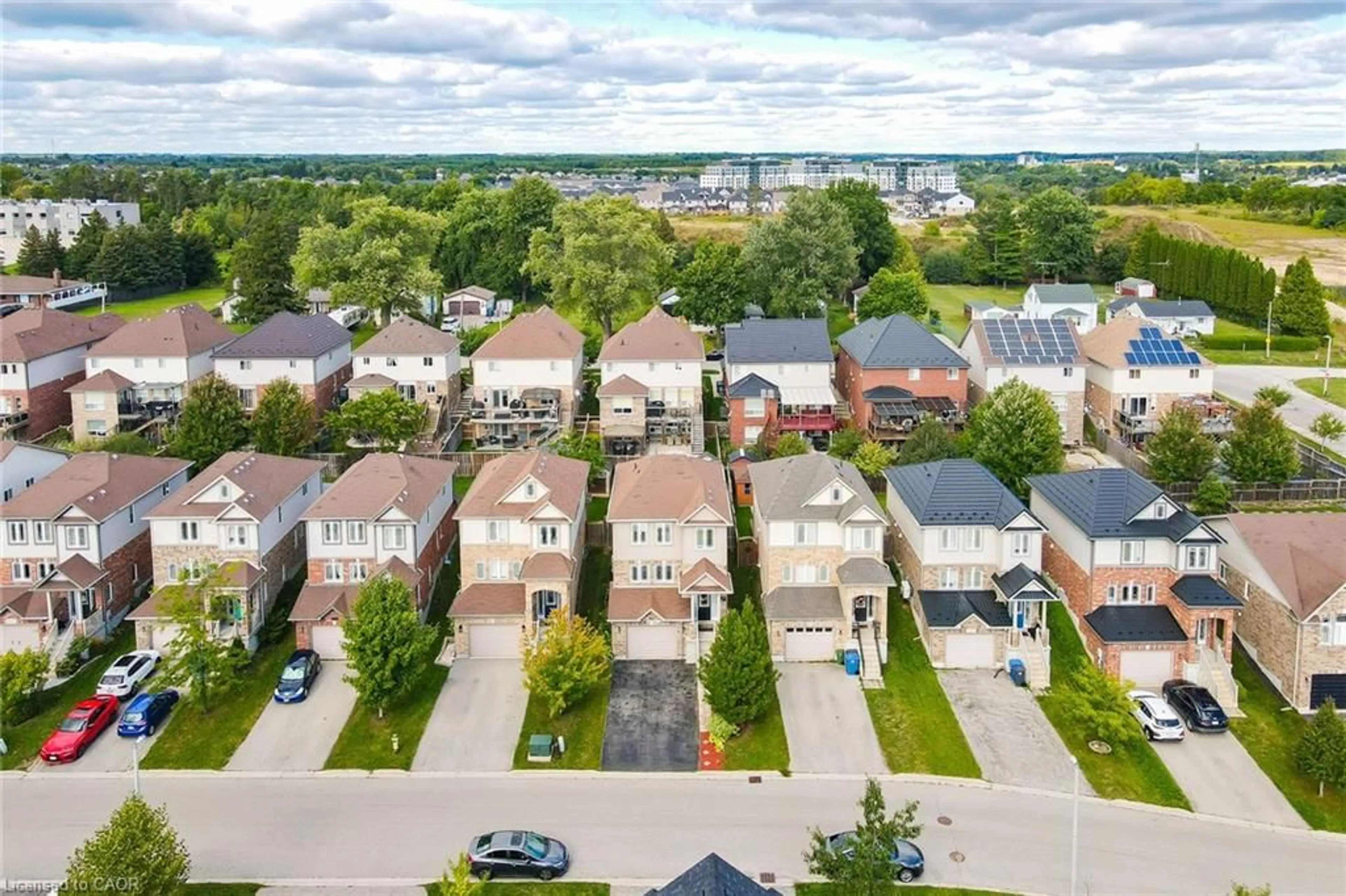 A pic from outside/outdoor area/front of a property/back of a property/a pic from drone, street for 110 Oakes Cres, Guelph Ontario N1E 0J5