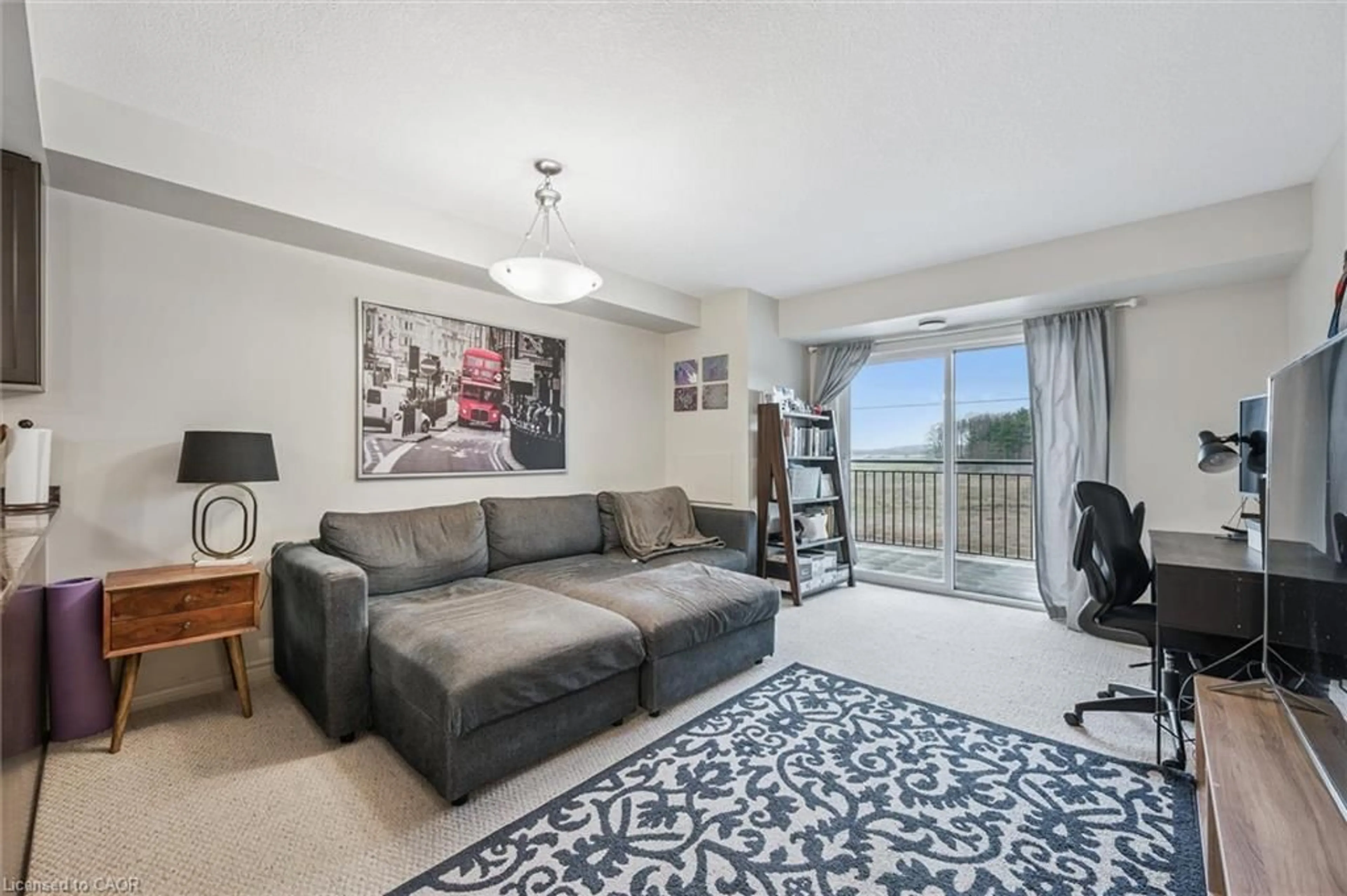 Living room with furniture, unknown for 45 Kingsbury Sq #406, Guelph Ontario N1L 0L2