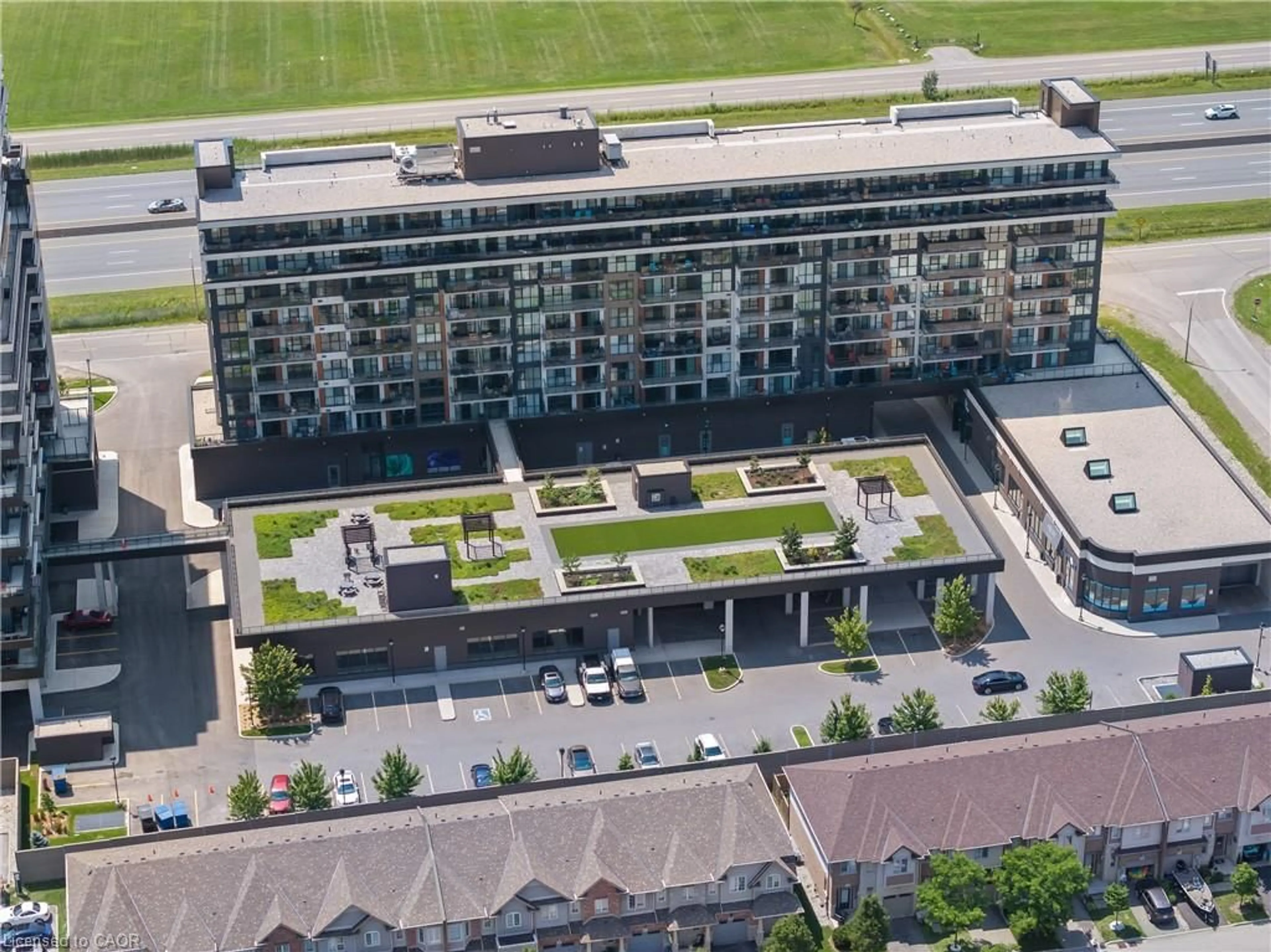 A pic from outside/outdoor area/front of a property/back of a property/a pic from drone, city buildings view from balcony for 550 North Service Rd #218, Grimsby Ontario L3M 0H9