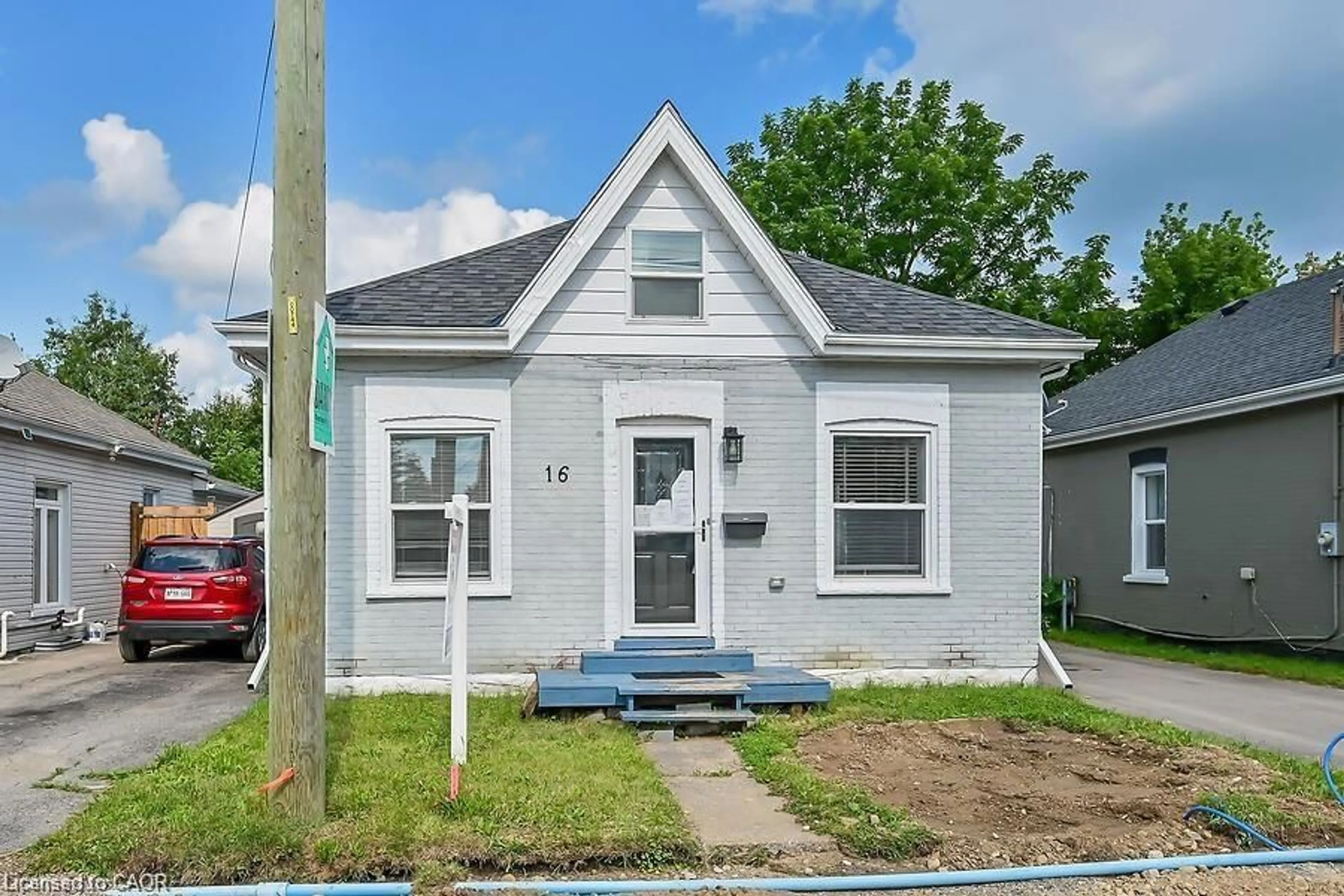 Home with vinyl exterior material, street for 16 Webling St, Brantford Ontario N3S 2S7