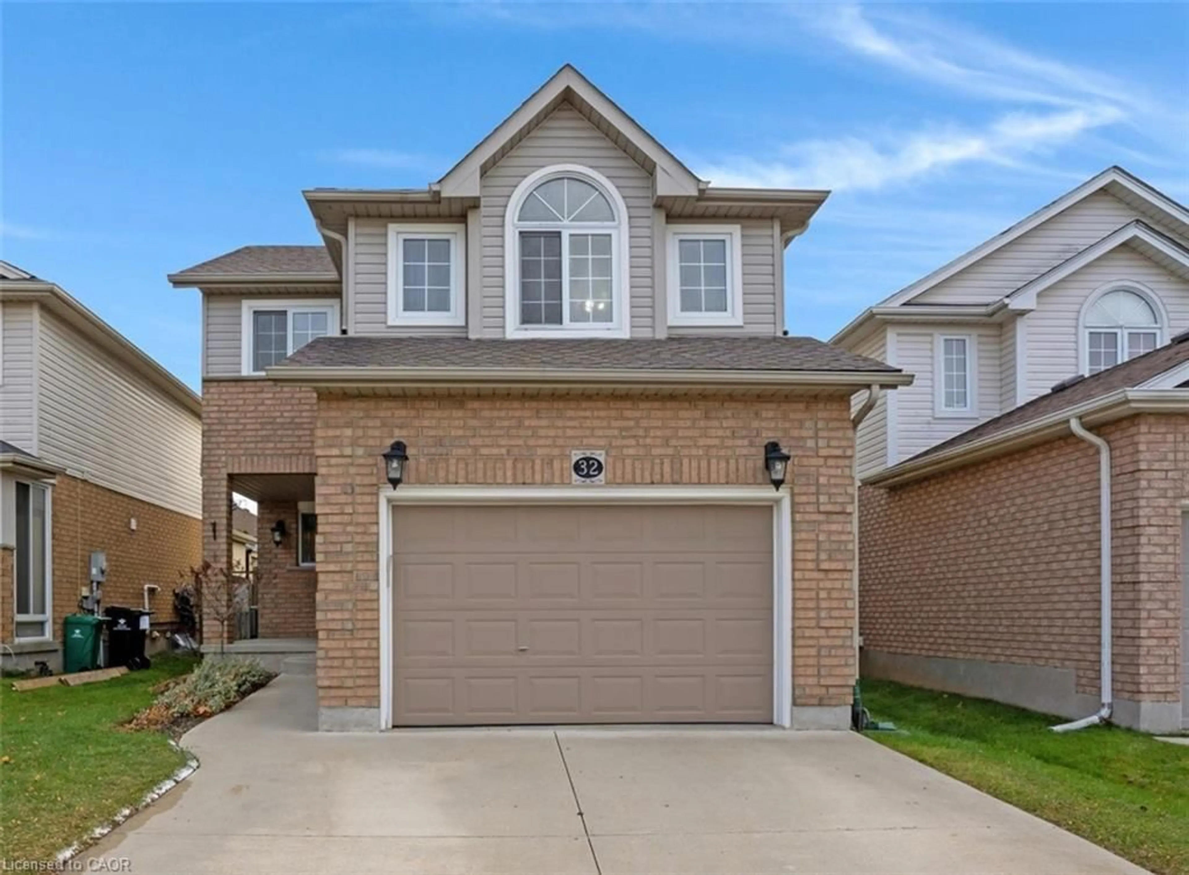 Home with brick exterior material, street for 32 Lilywood Dr, Cambridge Ontario N1P 1G9