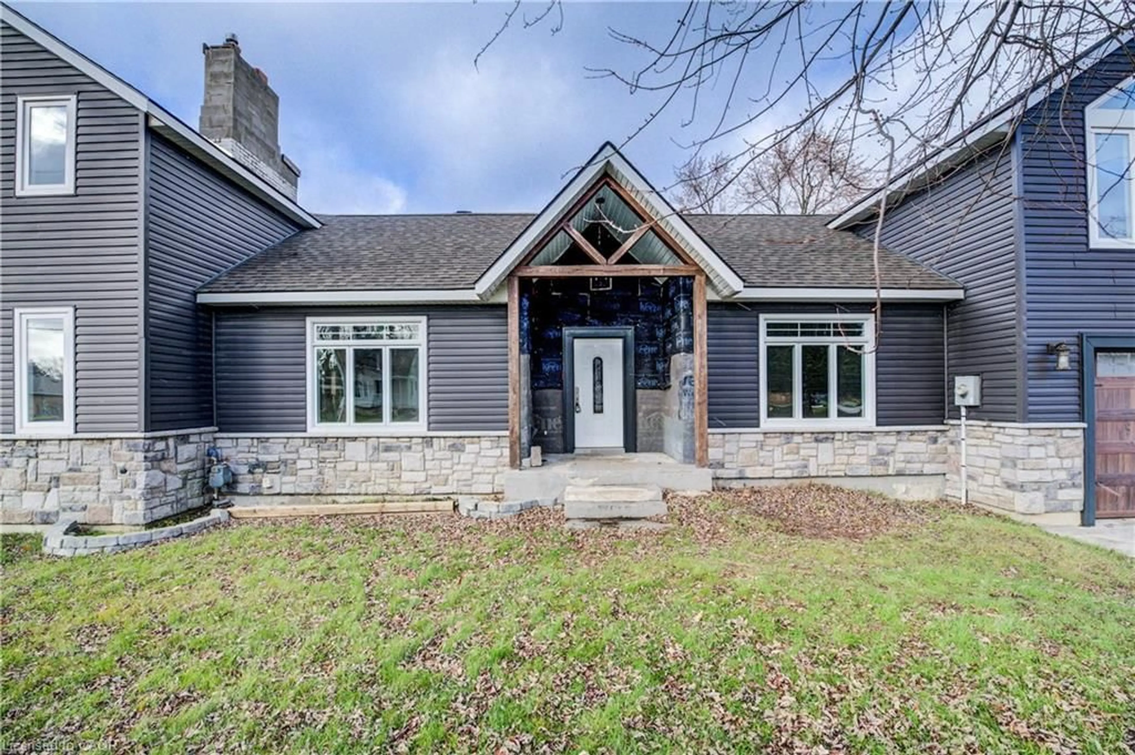 Home with brick exterior material, street for 14 Athlone Rd, Cambridge Ontario N1R 1H8