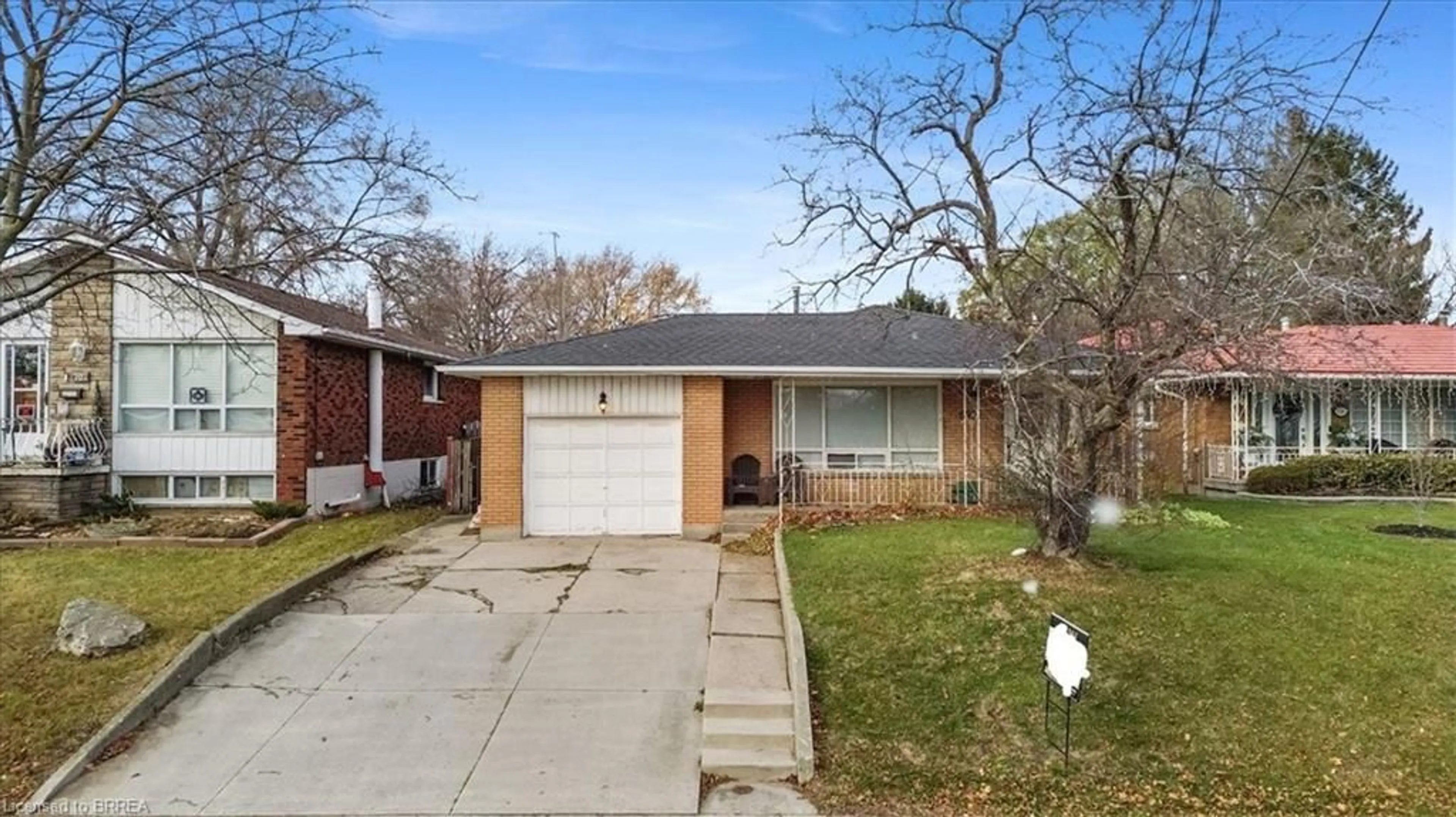 Home with brick exterior material, street for 698 West 5th St, Hamilton Ontario L9C 3R2