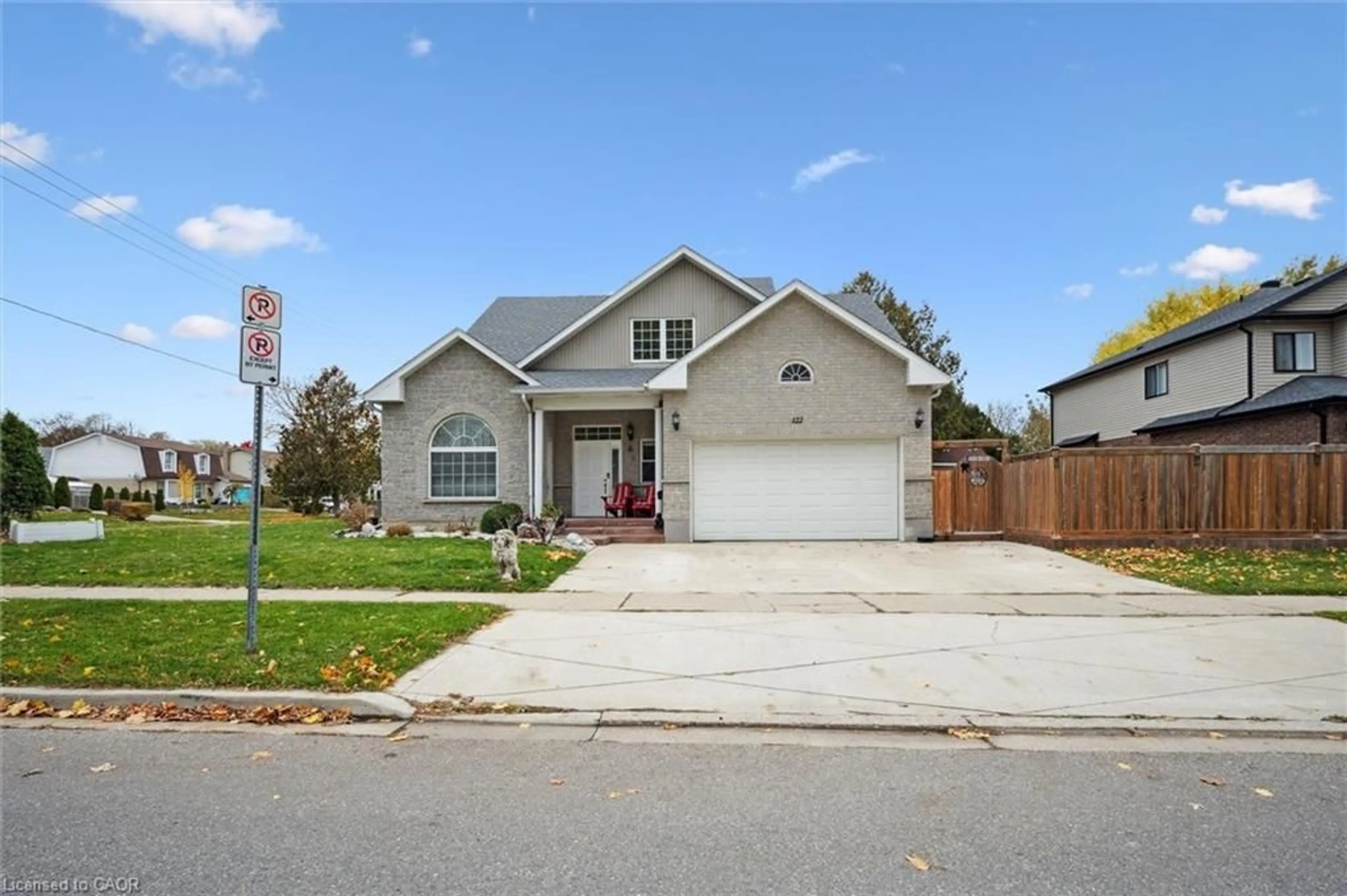 Home with vinyl exterior material, street for 122 Grand River Blvd, Kitchener Ontario N2A 4E3