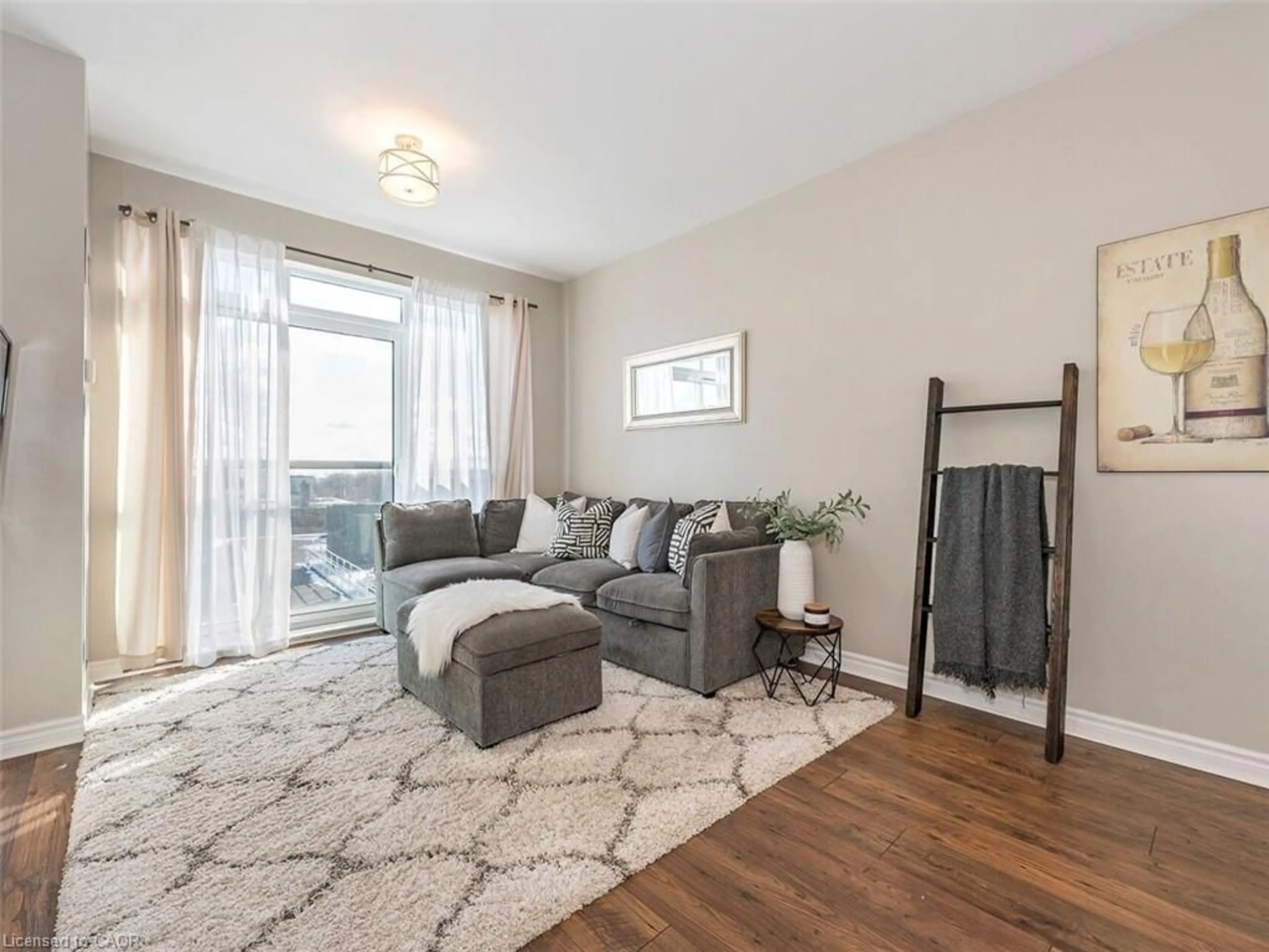 Living room with furniture, wood/laminate floor for 3865 Lake Shore Blvd #401, Etobicoke Ontario M8W 0A2