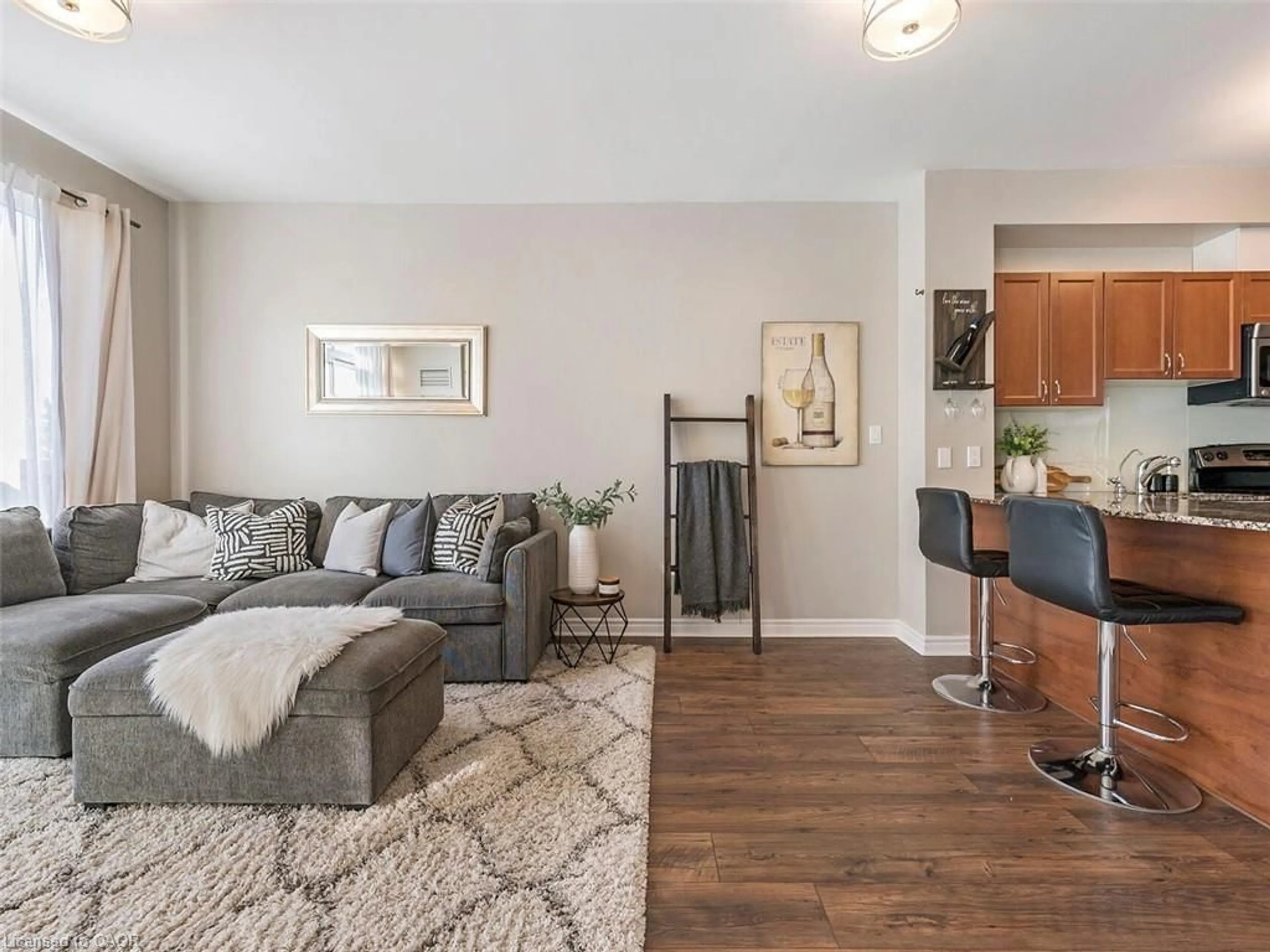 Living room with furniture, wood/laminate floor for 3865 Lake Shore Blvd #401, Etobicoke Ontario M8W 0A2