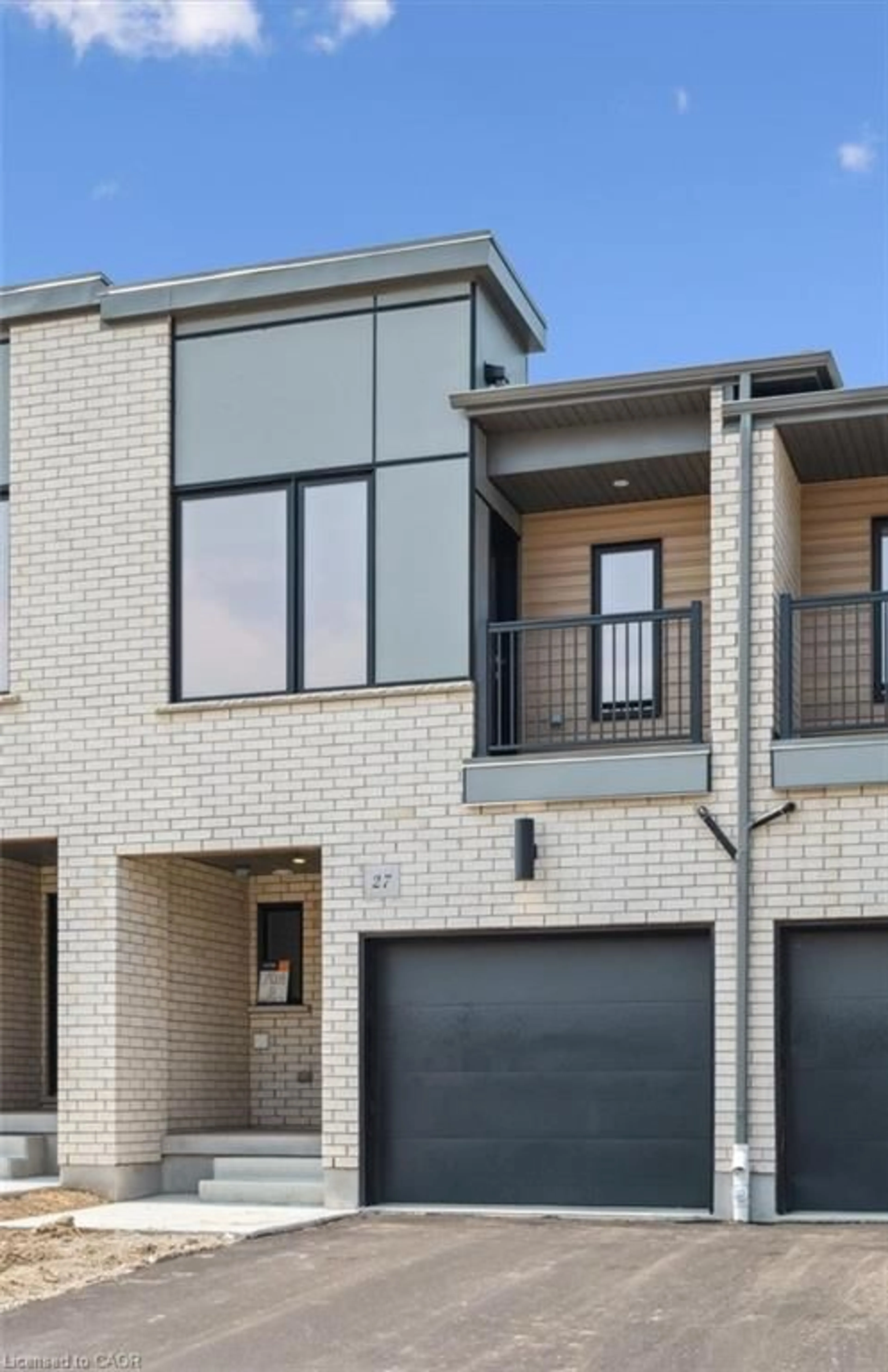 Home with brick exterior material, street for 27 Benninger Dr, Kitchener Ontario N2E 0K4