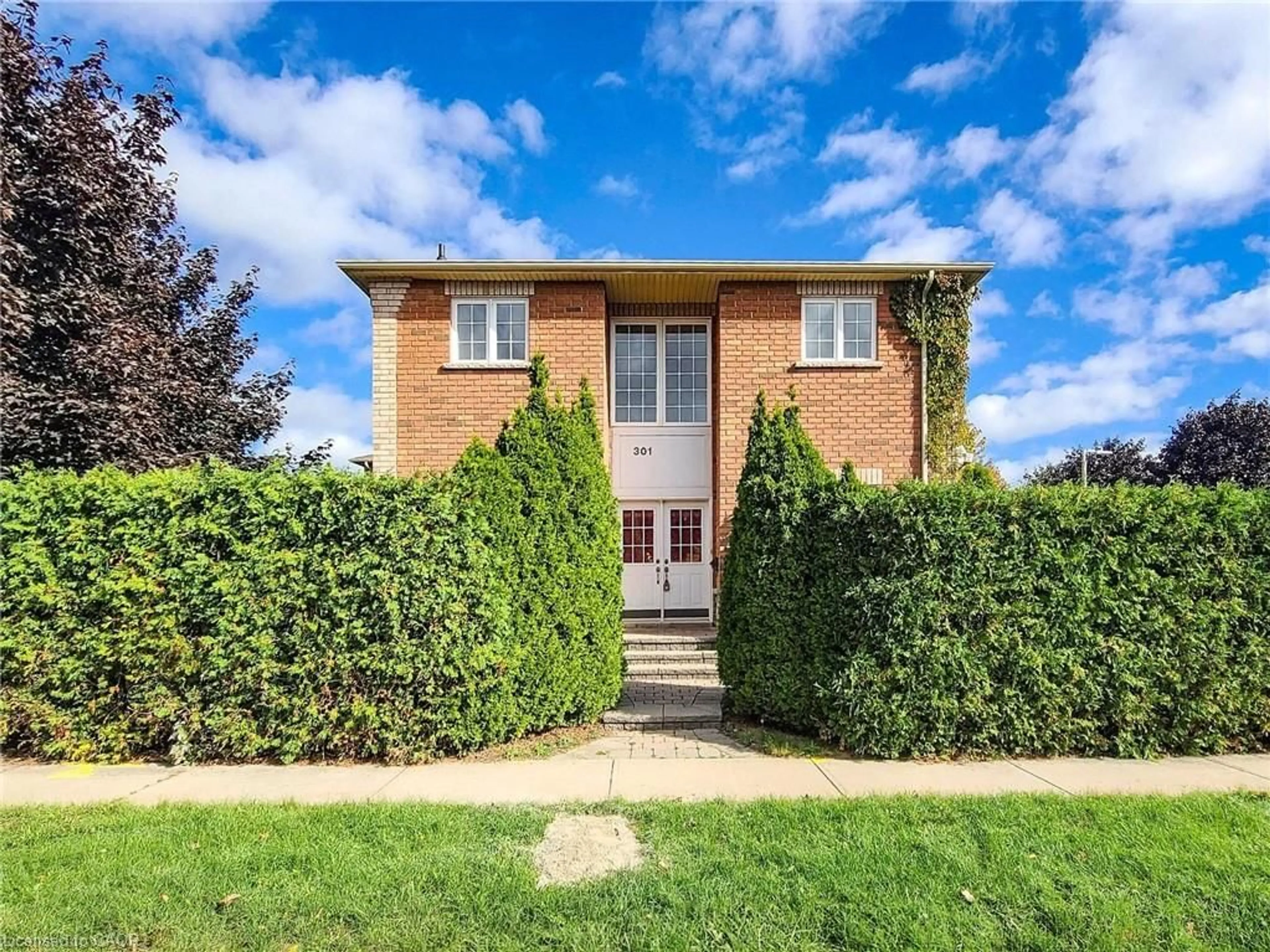 Home with brick exterior material, street for 301 Mohawk Rd, Oakville Ontario L6L 6P9