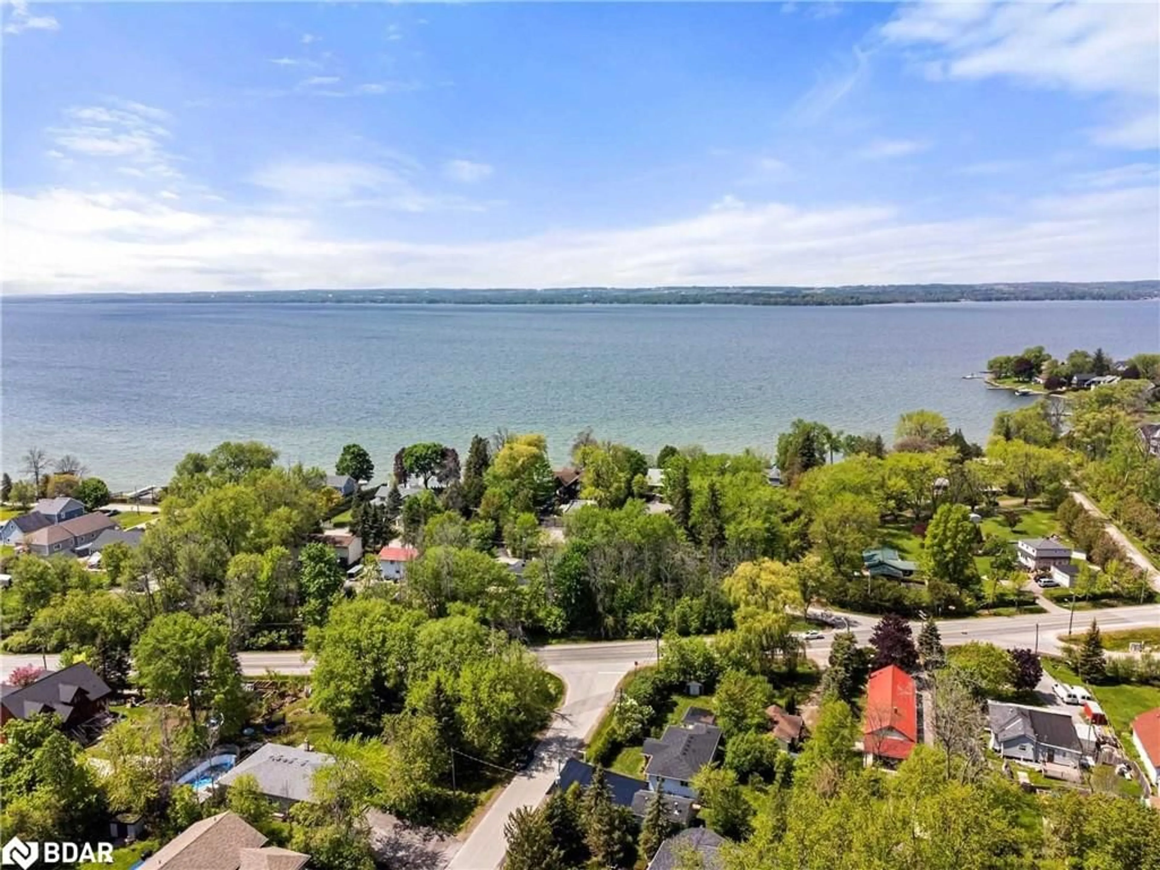 A pic from outside/outdoor area/front of a property/back of a property/a pic from drone, water/lake/river/ocean view for 4 Alice Ave, Keswick Ontario L4P 3C8