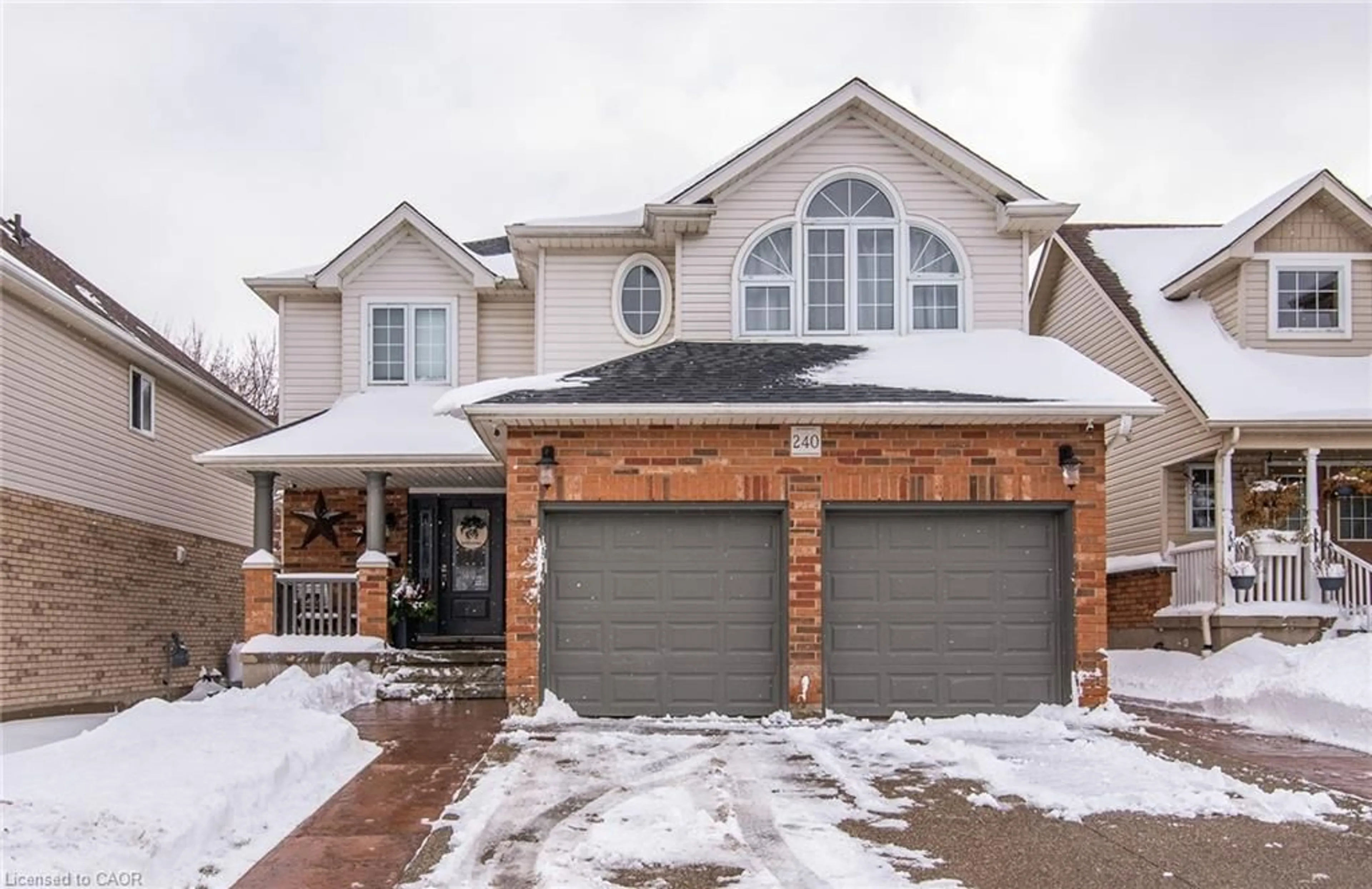 Home with brick exterior material, street for 240 Doon South Dr, Kitchener Ontario N2P 2L8