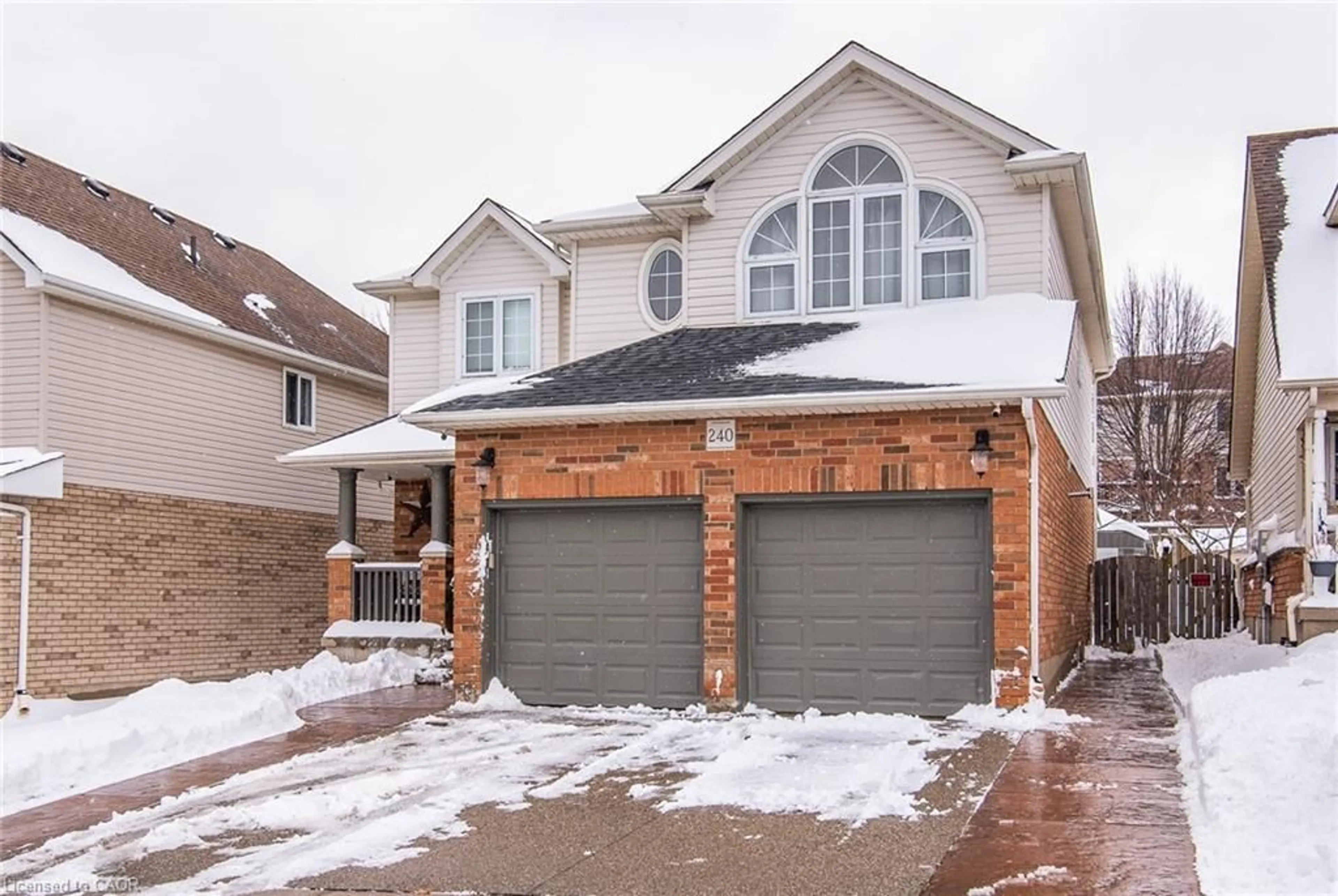 Home with brick exterior material, street for 240 Doon South Dr, Kitchener Ontario N2P 2L8