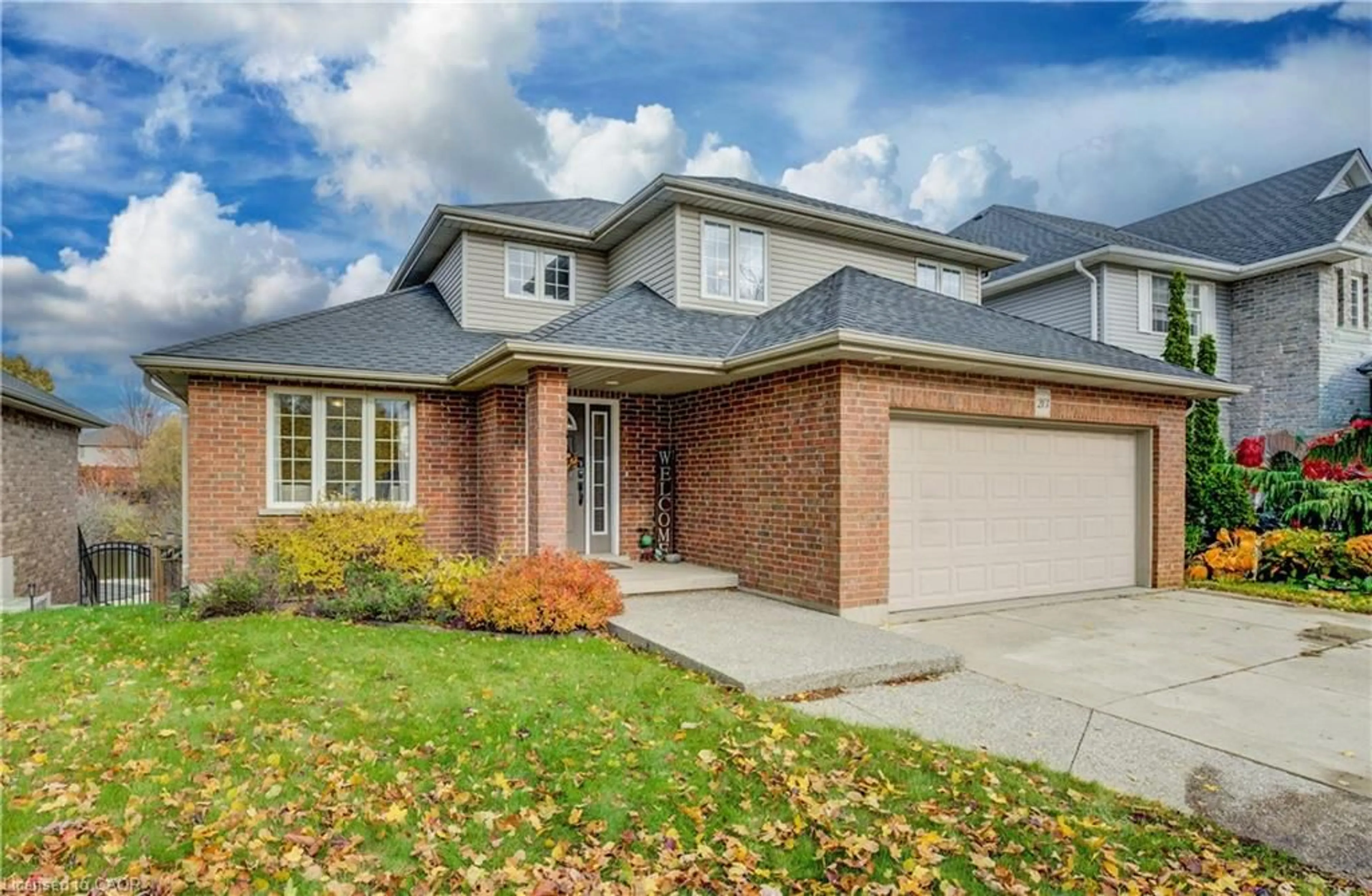 Home with brick exterior material, street for 213 Falcon Dr, Woodstock Ontario N4T 1W5