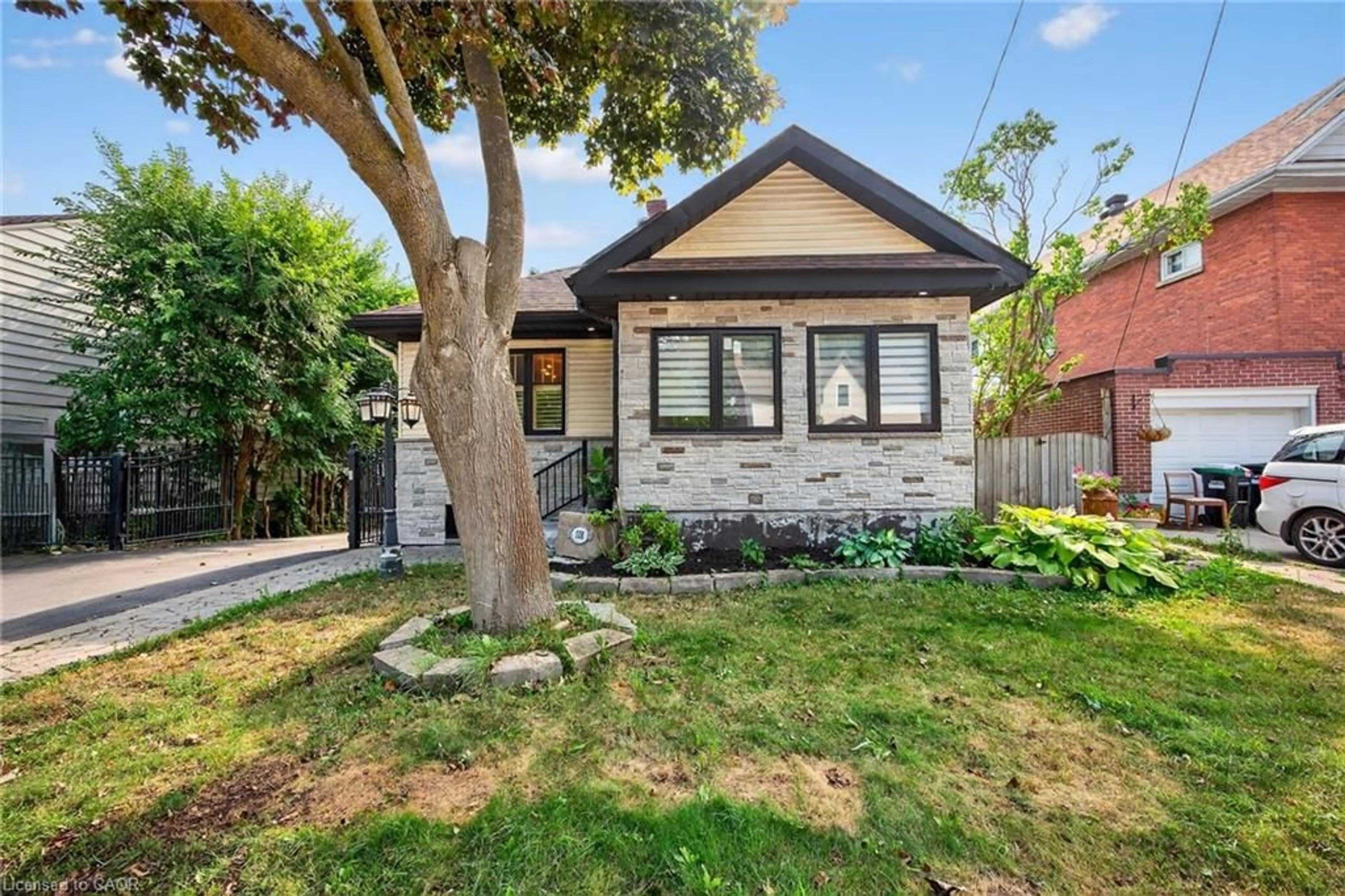 Home with brick exterior material, street for 108 Owen St, Barrie Ontario L4M 3H7