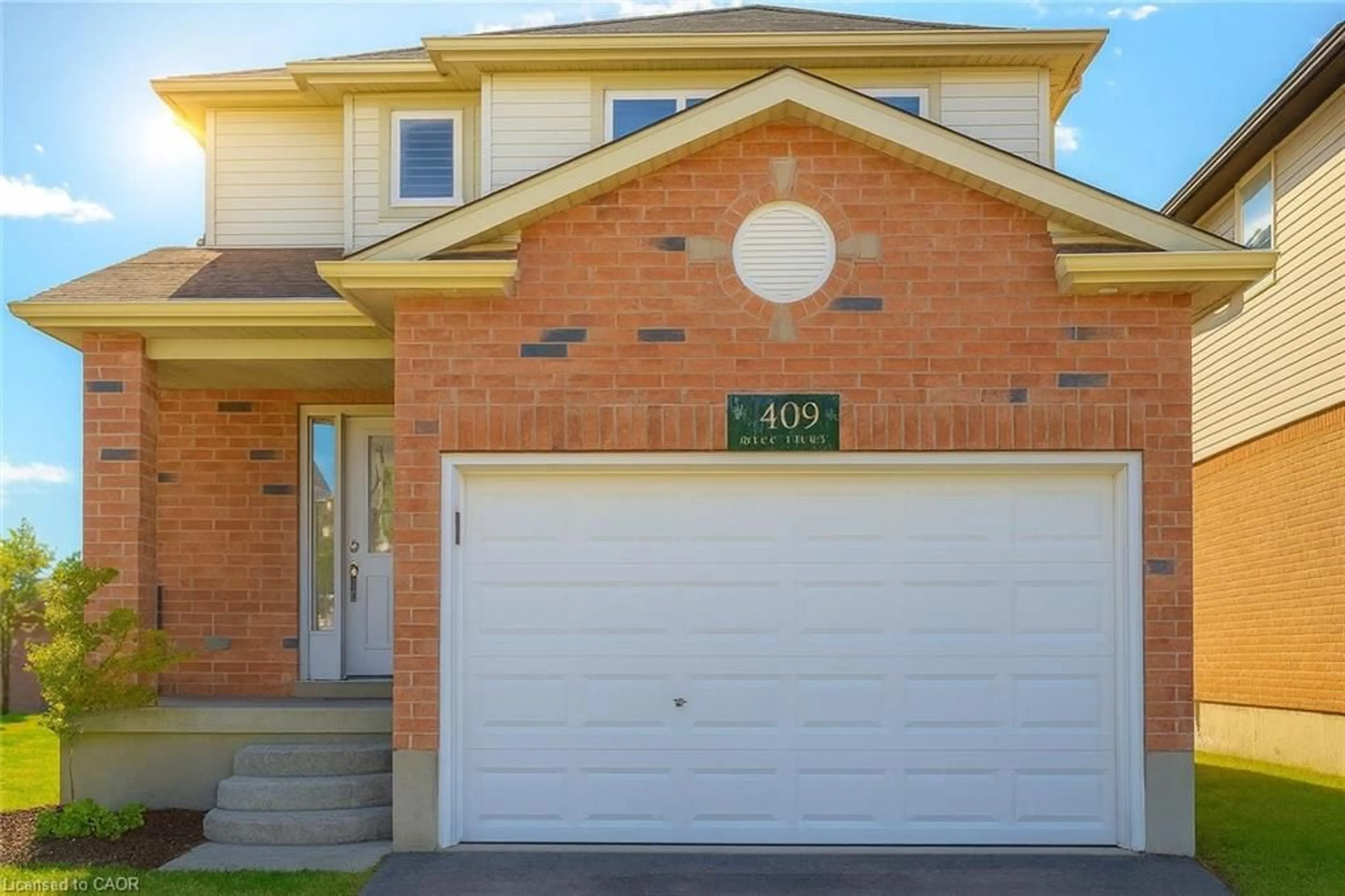 Home with brick exterior material, street for 1409 Old Zeller Dr, Kitchener Ontario N2A 4M8