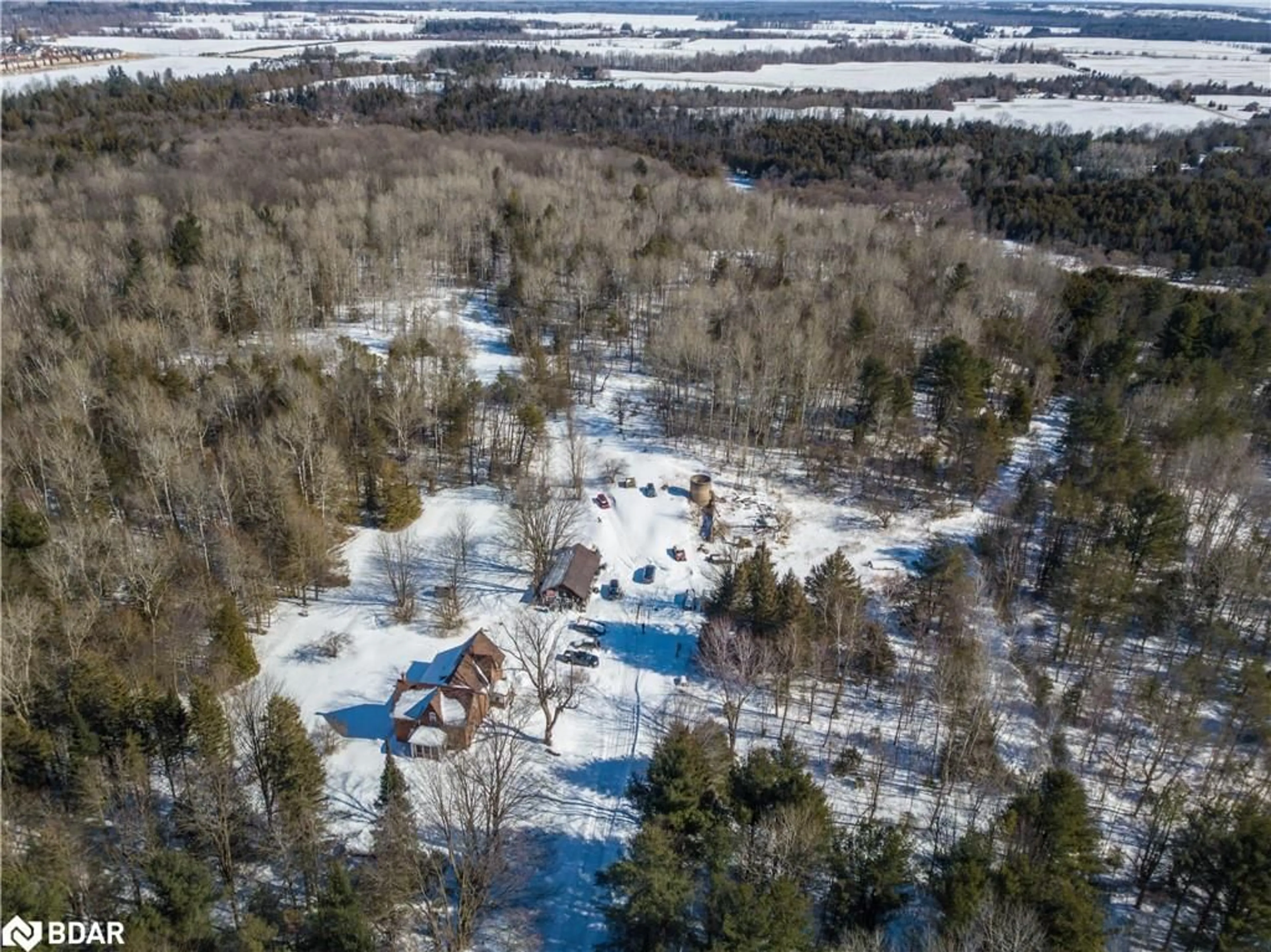 A pic from outside/outdoor area/front of a property/back of a property/a pic from drone, forest/trees view for 8137 4th Line, Angus Ontario L0M 1B0