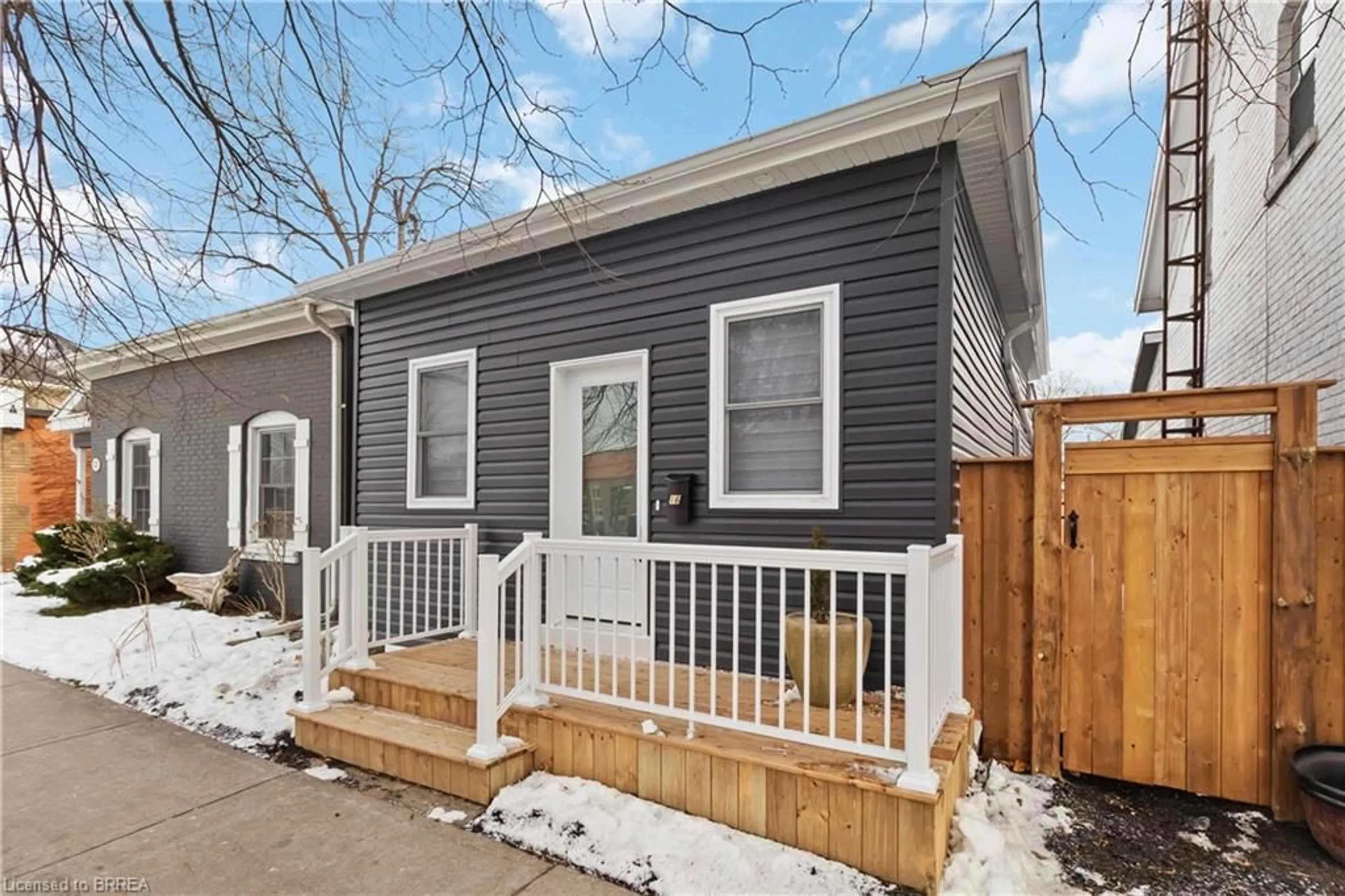 Home with vinyl exterior material, street for 16 Mt. Pleasant St, Brantford Ontario N3T 1S5